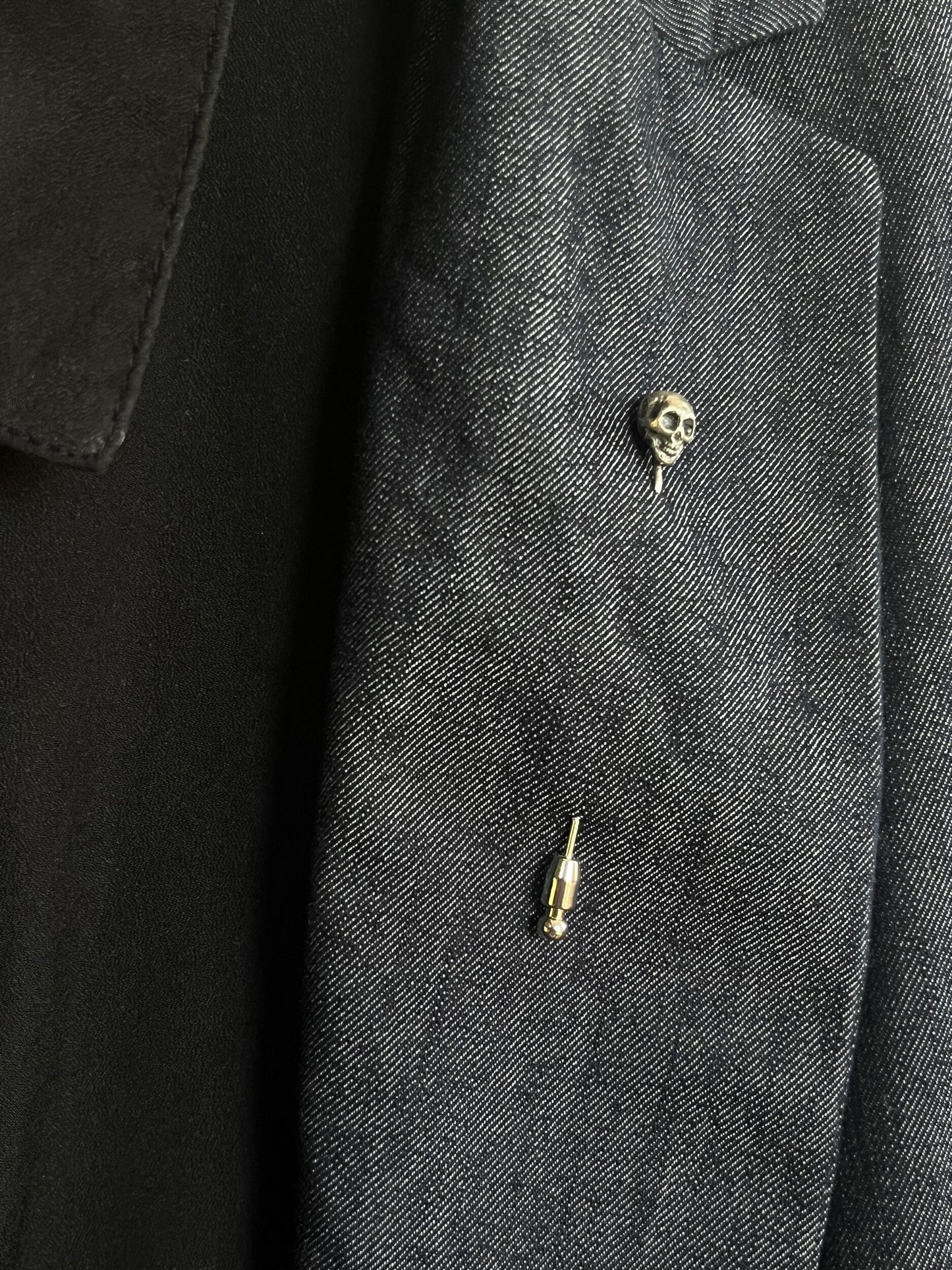 Yorick Skull Stick Pin This Skull Stick Pin is just darling if you like weird stuff. This Skull is wax carved by hand and cast using the ancient process of Lost Wax to cast them in sterling silver. I then made a mold, which I can inject with wax and make