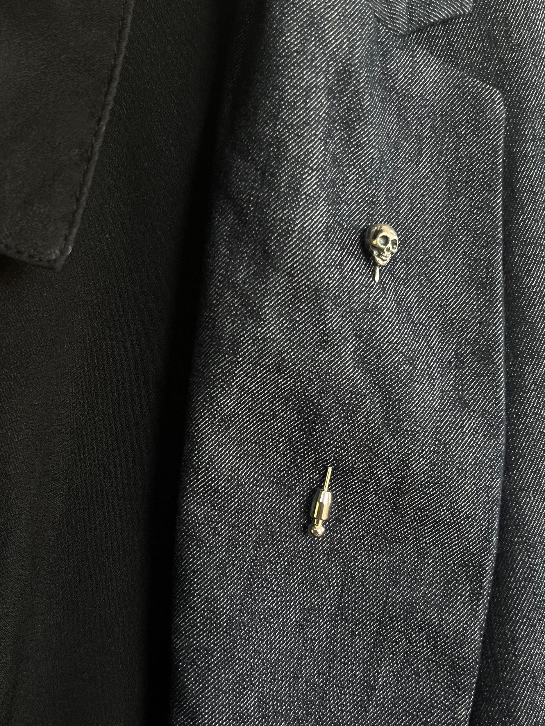 Yorick Skull Stick Pin This Skull Stick Pin is just darling if you like weird stuff. This Skull is wax carved by hand and cast using the ancient process of Lost Wax to cast them in sterling silver. I then made a mold, which I can inject with wax and make