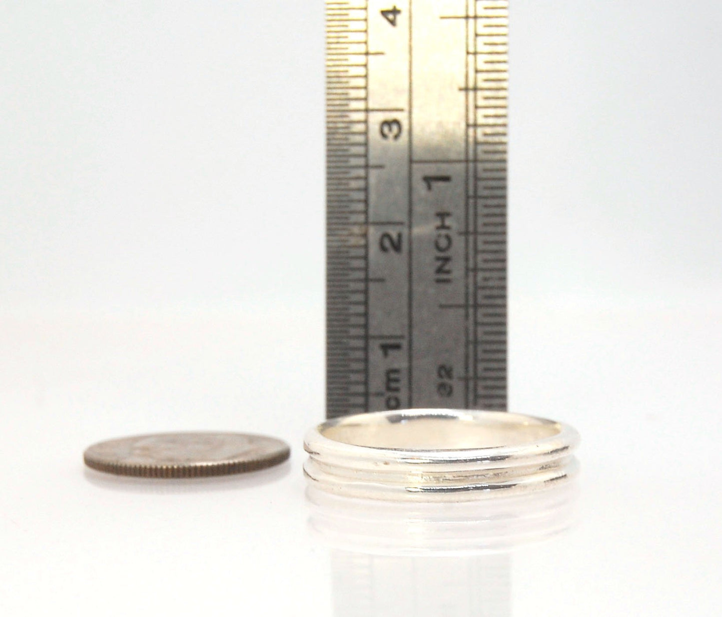 2 Rim 3.3mm Wide Band in Sterling silver Let me make a ring for you!This is a 2 rim band, 3.3 mm wide cast from a wax carving turned on a lathe and cast using the process of lost wax. These are so much fun to make and I have several variations of differen