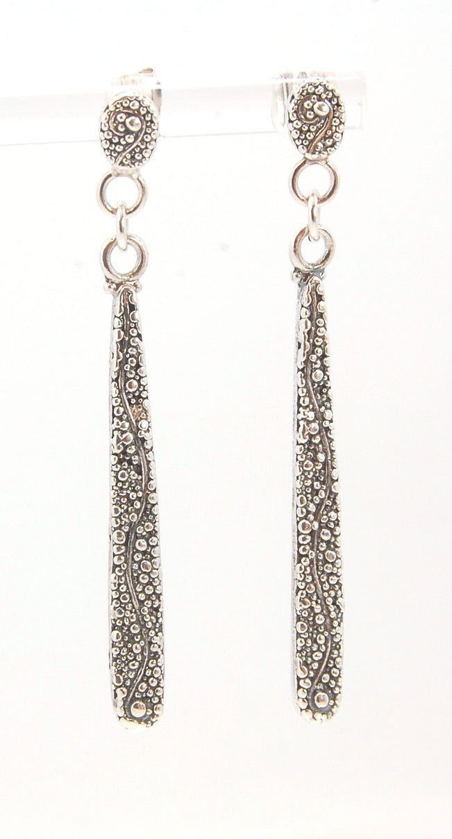 Seaweed Long Dangle Post Earrings These seaweed Post dangle earrings are cast versions of my original granulation work. Once the original work is made using the ancient technique of granulation, it is then molded for repeat waxes and then cast using the L