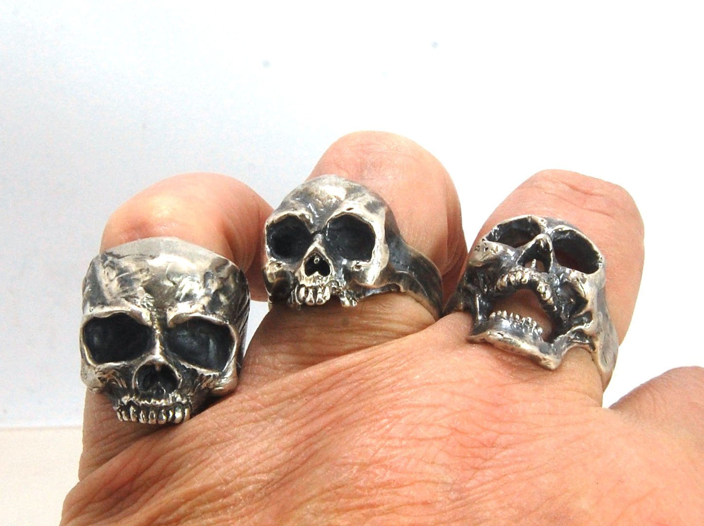 Screaming into the Void Skull Ring This is a lightweight but sizable skull ring that is Made to Order for you in your size. I carved this skull in wax, hollowed out the inside of the skull and cast it using the lost wax casting method. This Screaming into