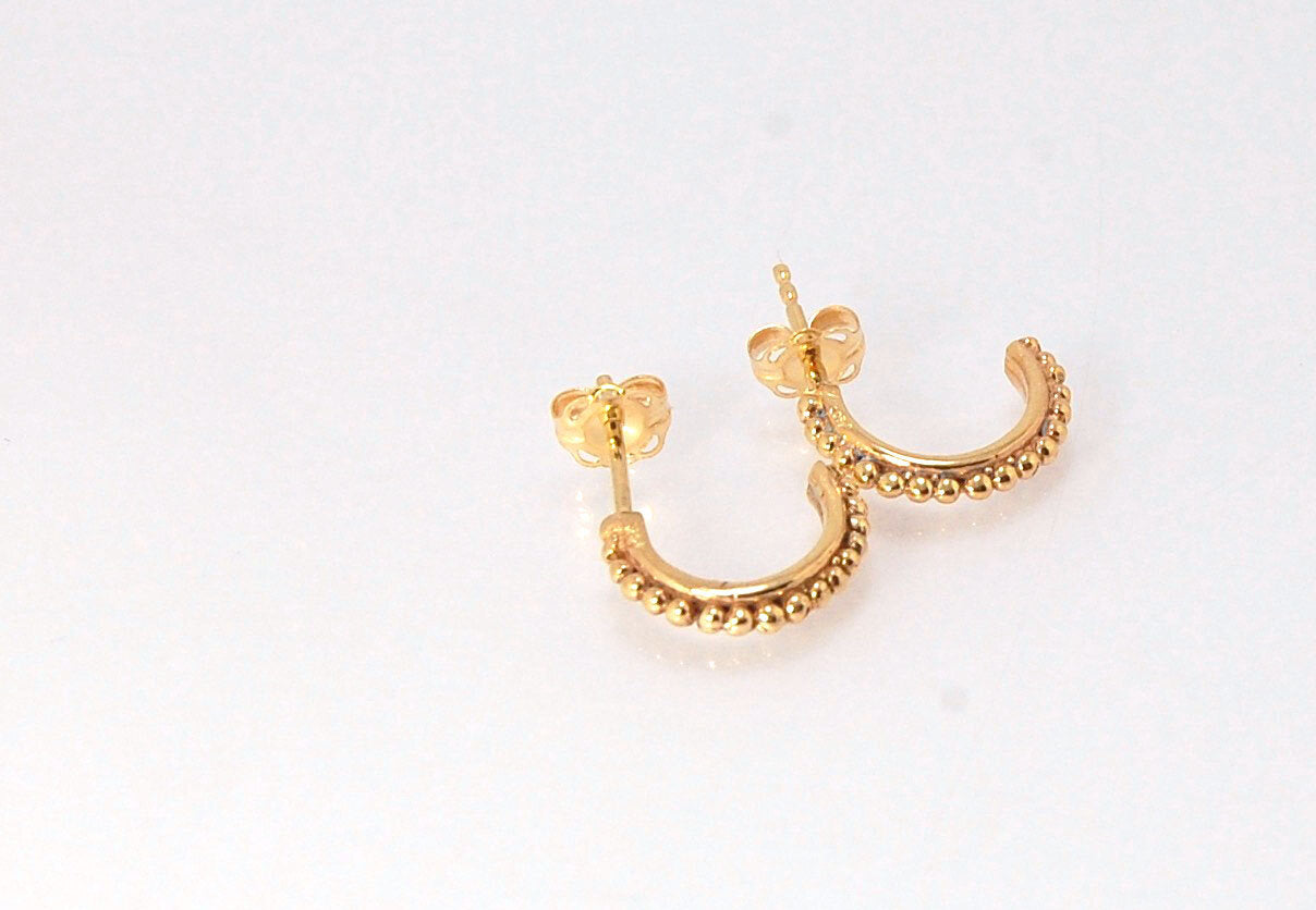 Etruscan Hoop Posts - Xtra Small in Sterling Silver These are my smallest Etruscan Hoops as a post-earring! Smaller than a dime - these post hoops hug your earlobe. So freakin’ cute! I like to wear them in my second piercing up and I prefer the gold! But