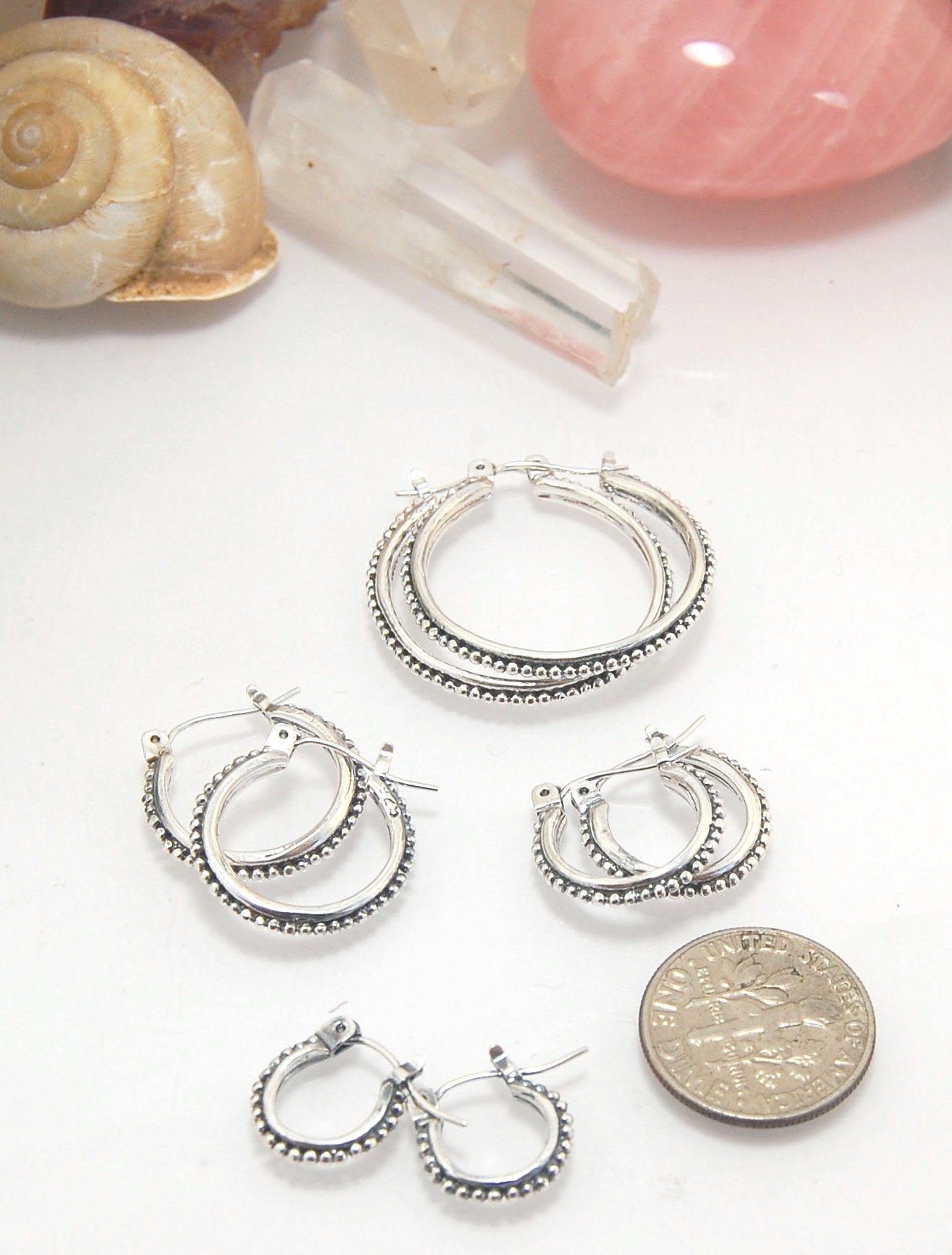 Etruscan hoops in Sterling Silver - Medium These sterling silver hoops are cast in my studio from a granulated master for a limited edition series of cast, granulated hoops. I use fine silver for the original granulation, then make a mold, pull a wax copy