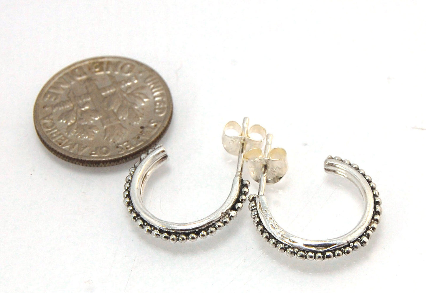 Etruscan Hoop Posts - Medium - Sterling Silver These are my Medium sized Etruscan Hoops as a post-earring!These sterling silver hoop posts are cast using the Lost Wax process from a granulated master for a limited edition series of hoops. I use fine silve