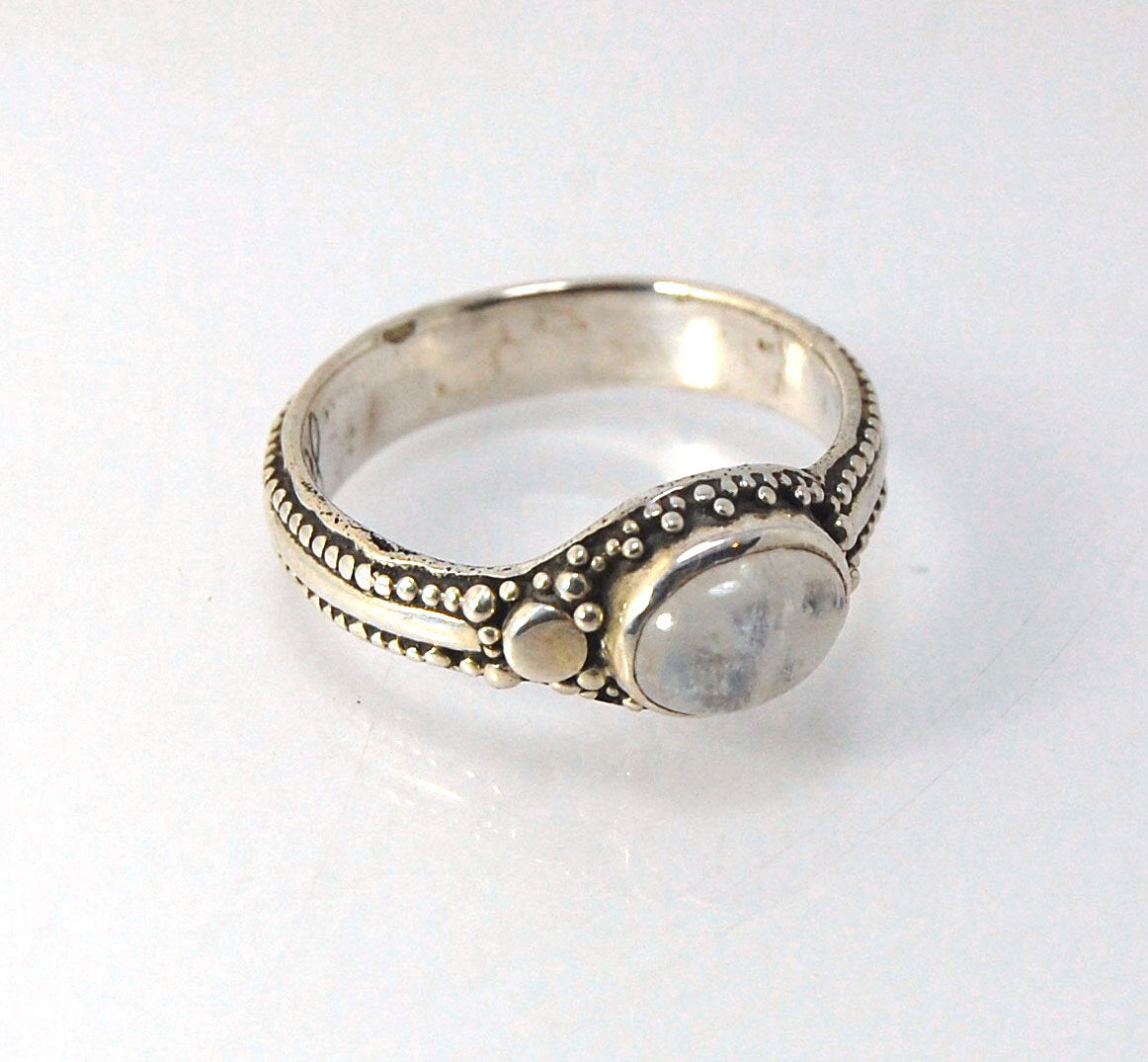 Rainbow Moonstone Fine Silver Asymmetrical Granulated Ring -size 8.5 This Moonstone cabochon is bezel-set in Fine Silver Granulation in a asymmetrical pattern.Granulation is an ancient fusing process utilized for thousands of years by the Etruscans and My