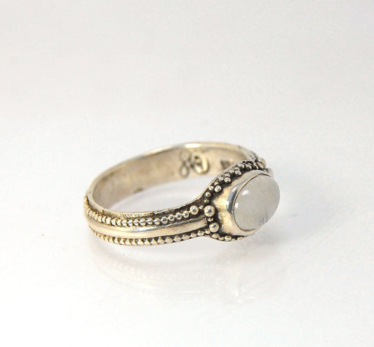 Rainbow Moonstone Fine Silver Asymmetrical Granulated Ring -size 8.5 This Moonstone cabochon is bezel-set in Fine Silver Granulation in a asymmetrical pattern.Granulation is an ancient fusing process utilized for thousands of years by the Etruscans and My