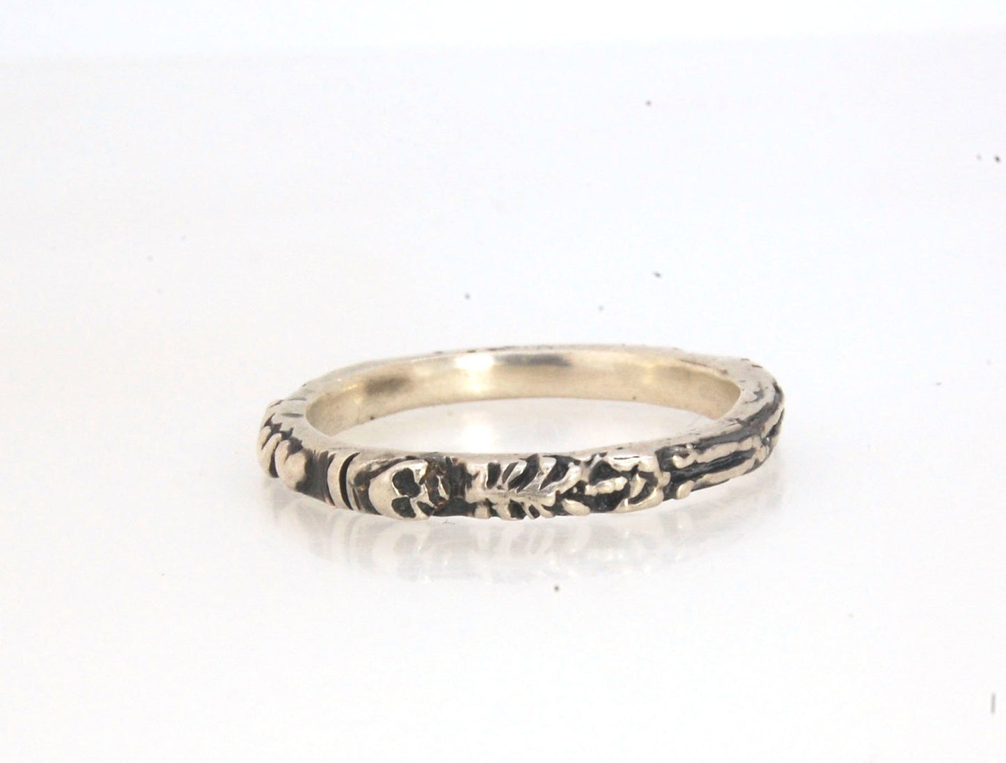 Oxidized Memento Mori Skeleton Ring - 2.7mm - Sterling Silver This is the most narrow of my Memento Mori Skeleton rings at 2.7mm wide! The Skeleton is flanked by crossed bones on one side and intertwined hearts and an hourglass on the other. This is the 4
