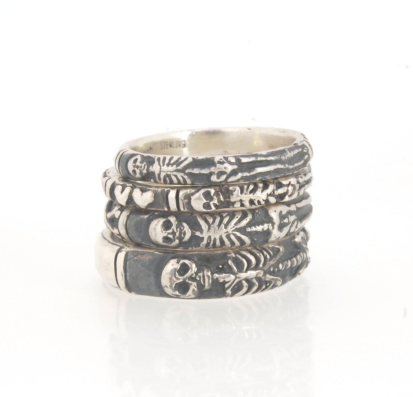 Oxidized Memento Mori Skeleton Ring - 2.7mm - Sterling Silver This is the most narrow of my Memento Mori Skeleton rings at 2.7mm wide! The Skeleton is flanked by crossed bones on one side and intertwined hearts and an hourglass on the other. This is the 4