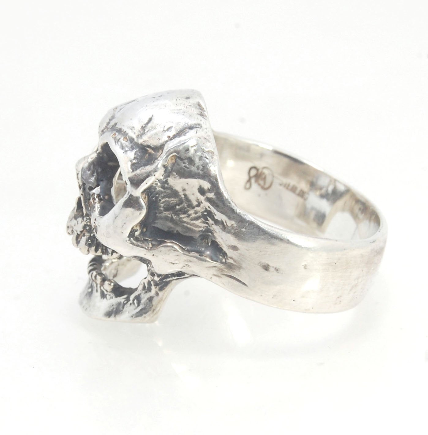 Screaming into the Void Skull Ring This is a lightweight but sizable skull ring that is Made to Order for you in your size. I carved this skull in wax, hollowed out the inside of the skull and cast it using the lost wax casting method. This Screaming into
