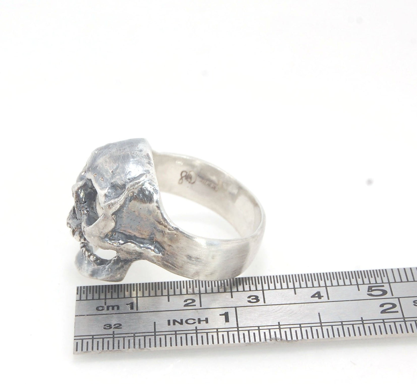 Screaming into the Void Skull Ring This is a lightweight but sizable skull ring that is Made to Order for you in your size. I carved this skull in wax, hollowed out the inside of the skull and cast it using the lost wax casting method. This Screaming into