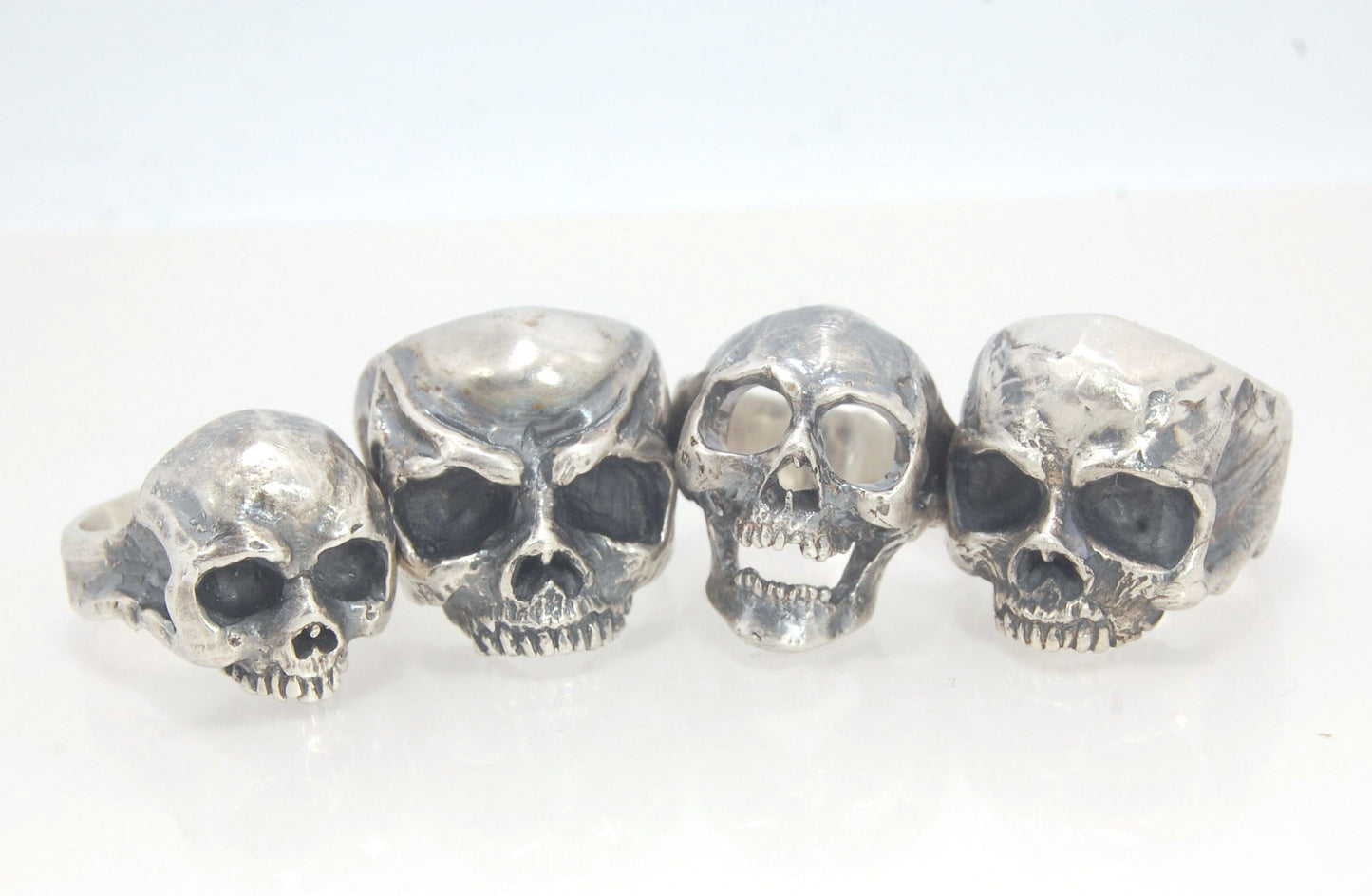 Screaming into the Void Skull Ring This is a lightweight but sizable skull ring that is Made to Order for you in your size. I carved this skull in wax, hollowed out the inside of the skull and cast it using the lost wax casting method. This Screaming into