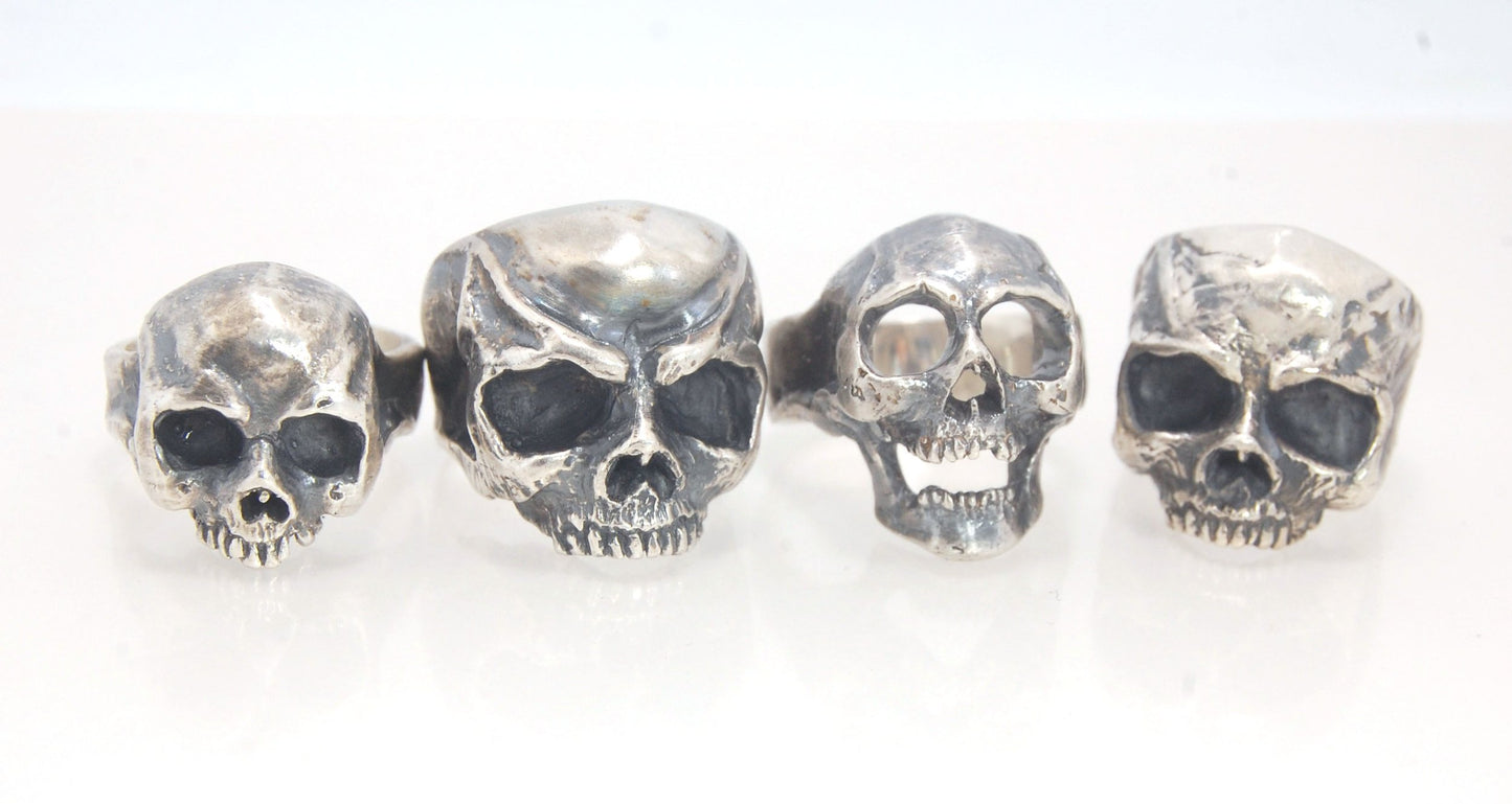 Screaming into the Void Skull Ring This is a lightweight but sizable skull ring that is Made to Order for you in your size. I carved this skull in wax, hollowed out the inside of the skull and cast it using the lost wax casting method. This Screaming into