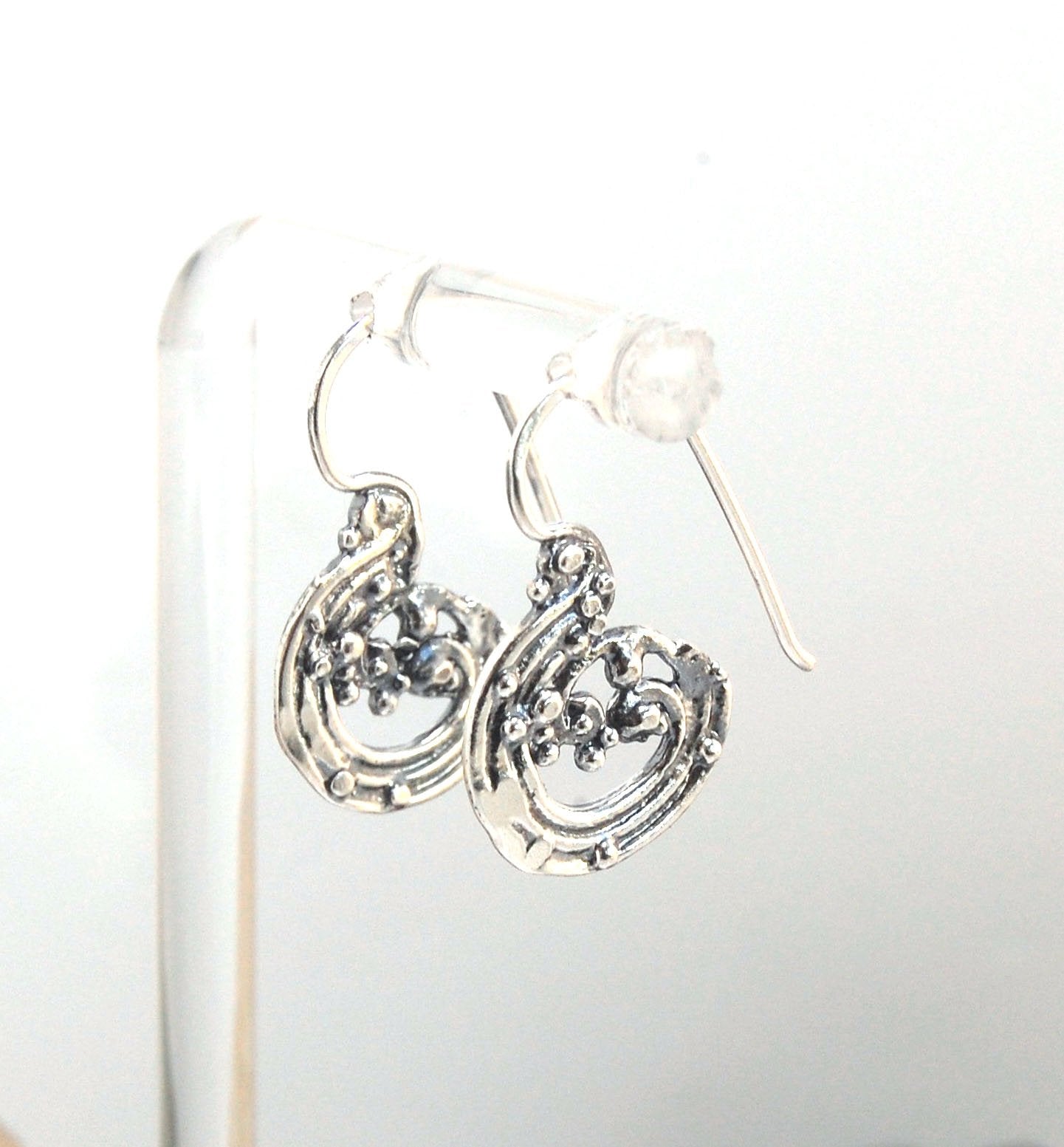 Wave Hoops - Sterling - Small These small Wave Hoops are part of The Minoan Collection. These great Wave Hoops are cast versions of original fine silver granulation work, which is then molded for repeat waxes and then cast in my studio. Granulation is an