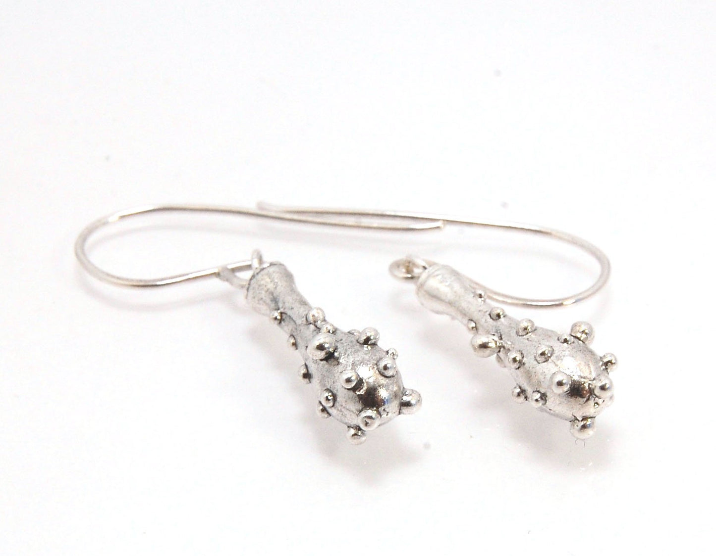 Bubble Club Dangle Earrings in Sterling These fun dangle earrings started as an experiment in wax that I ended up just LOVING!Here they are in Sterling after being cast using the ancient lost wax process. I then made a mold so I can make as many as I want