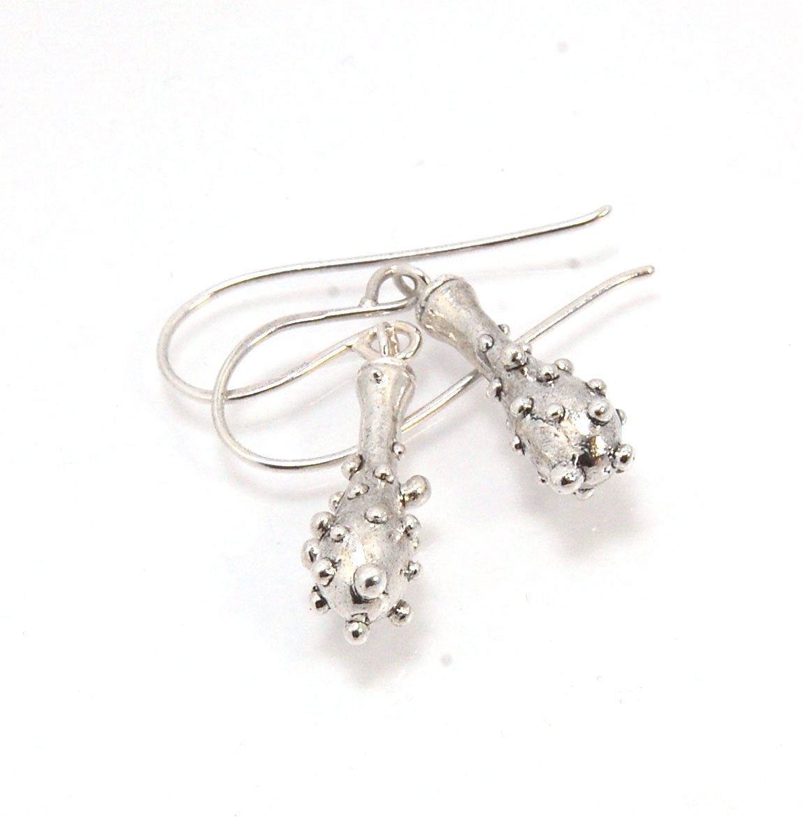 Bubble Club Dangle Earrings in Sterling These fun dangle earrings started as an experiment in wax that I ended up just LOVING!Here they are in Sterling after being cast using the ancient lost wax process. I then made a mold so I can make as many as I want