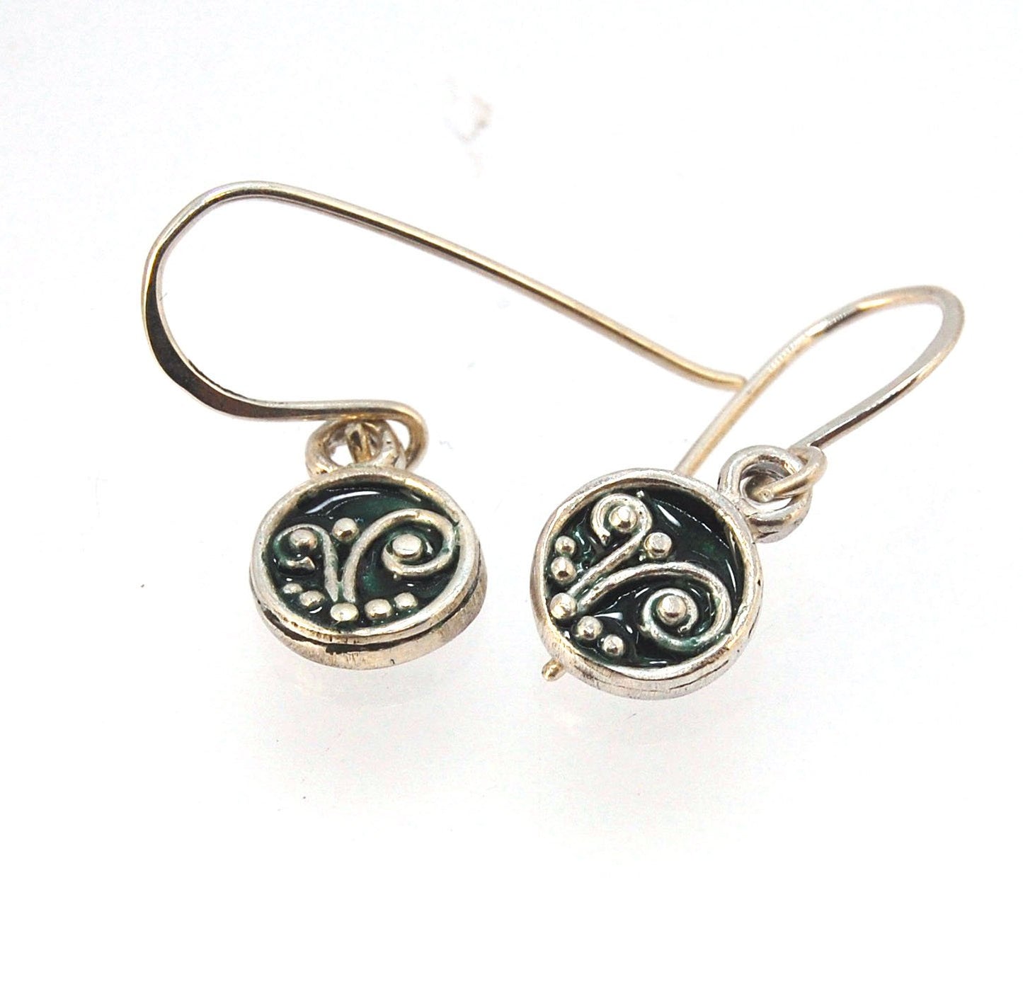 Enameled Sterling Fern Earrings -Circle -Small These are my smallest fern circles and they can be enameled in 8 colors for you!Prussian Blue, Icy Blue, Turquoise, Oil Gray, Forest Green, Jade Green, Sage Green or Periwinkle BlueGreen.These enameled 11mm o