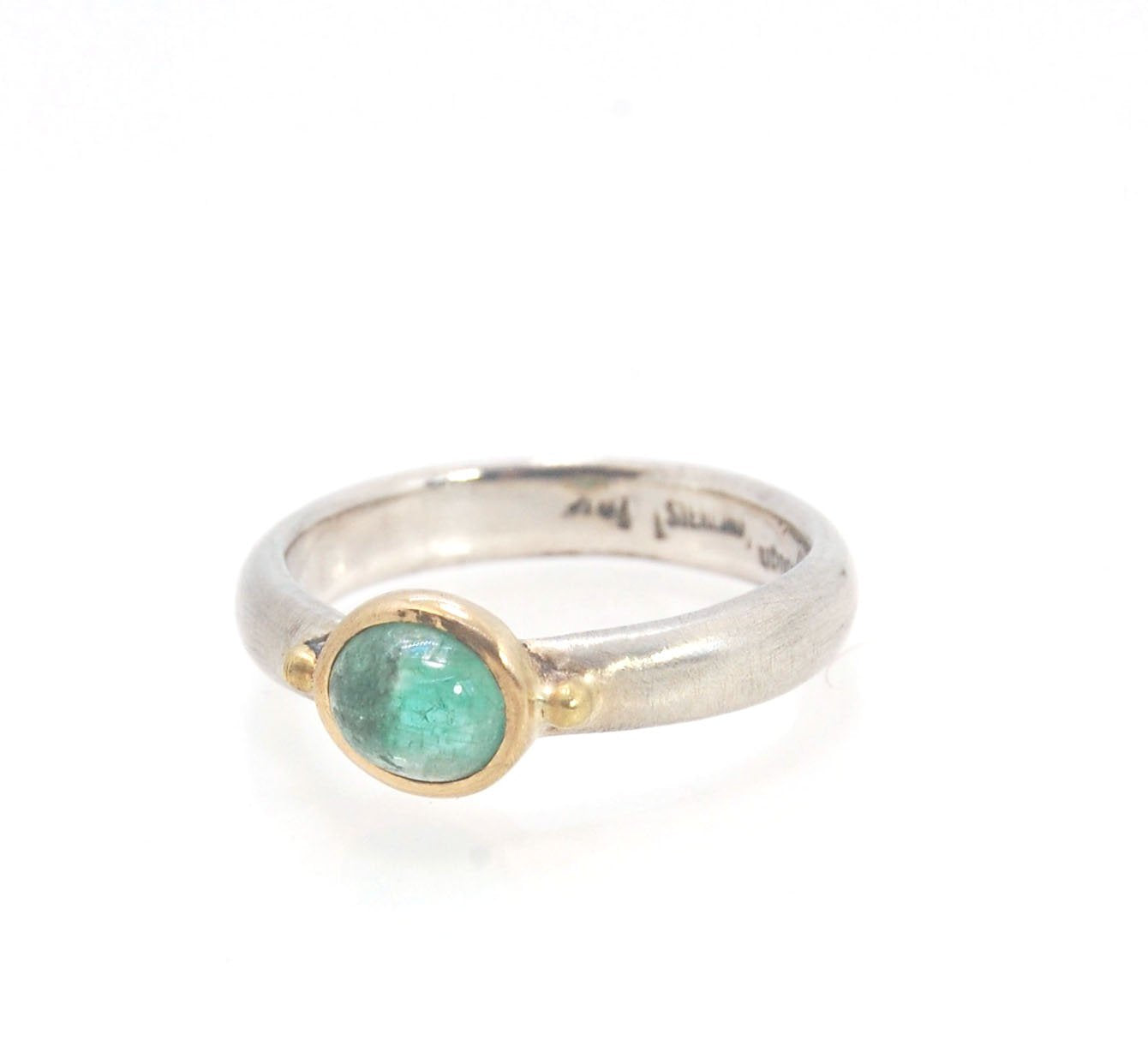 Emerald Bi Metal Freckle Ring - 14k and Sterling Silver - Size 8 This is a unique emerald cabochon with a darker freckle included in the lighter-colored emerald! This emerald cabochon is bezel-set in 14k gold with large gold granules on the Sterling Silve
