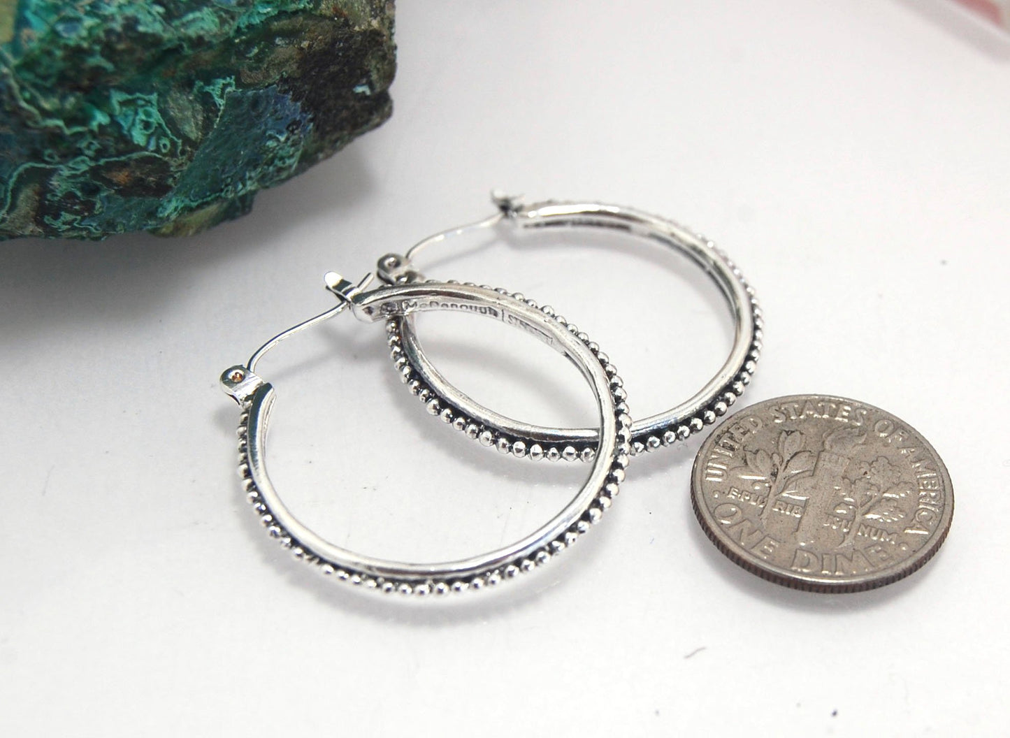 Etruscan Hoops in Sterling Silver - Large These sterling silver hoops are cast using the Lost Wax process from a granulated master for a limited edition series of hoops. I use fine silver for the original granulation, then make a mold, pull a wax copy fro