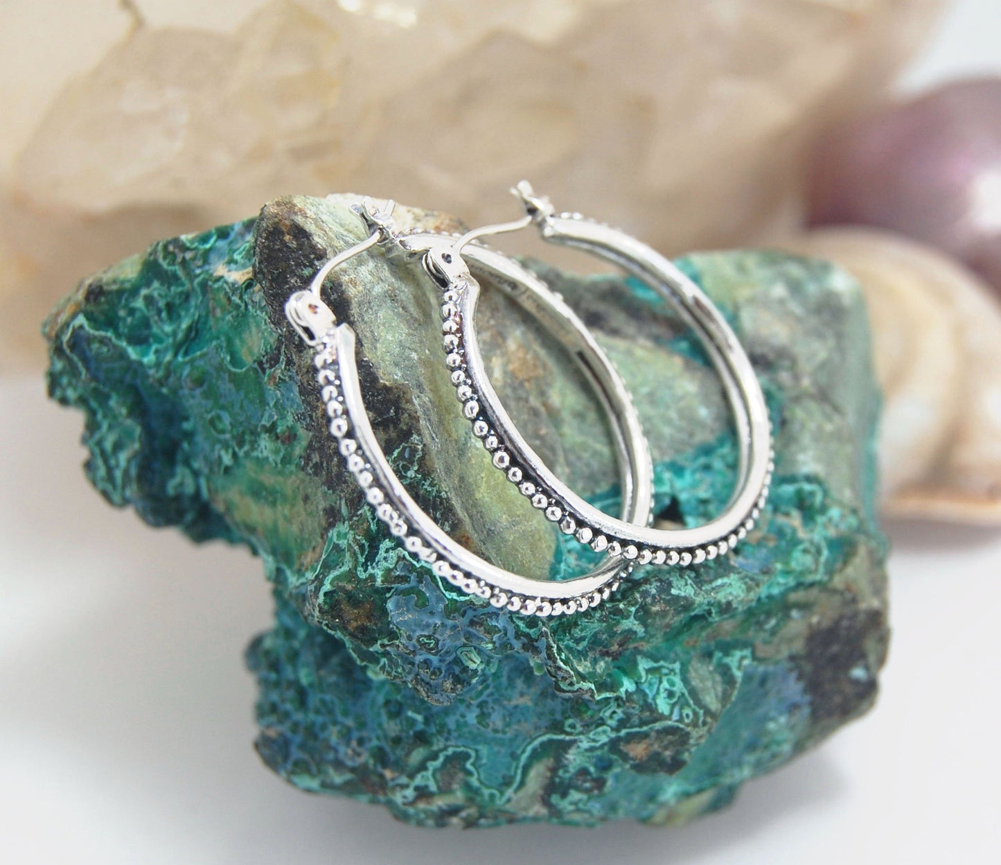 Etruscan Hoops in Sterling Silver - Large These sterling silver hoops are cast using the Lost Wax process from a granulated master for a limited edition series of hoops. I use fine silver for the original granulation, then make a mold, pull a wax copy fro