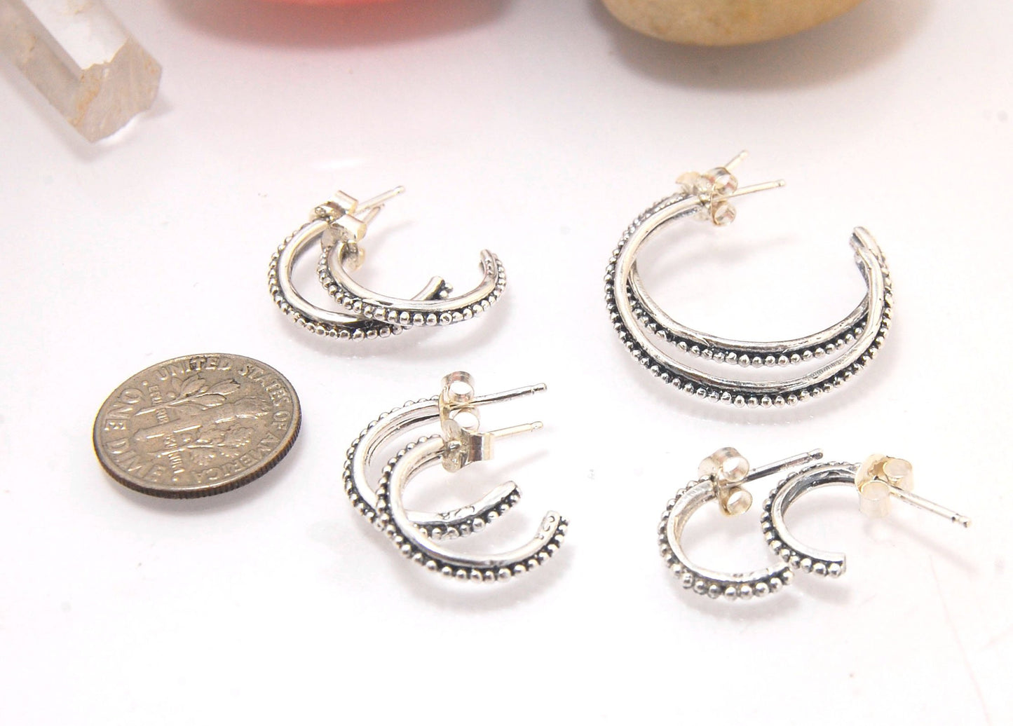 Etruscan Hoop Posts - Xtra Small in Sterling Silver These are my smallest Etruscan Hoops as a post-earring! Smaller than a dime - these post hoops hug your earlobe. So freakin’ cute! I like to wear them in my second piercing up and I prefer the gold! But