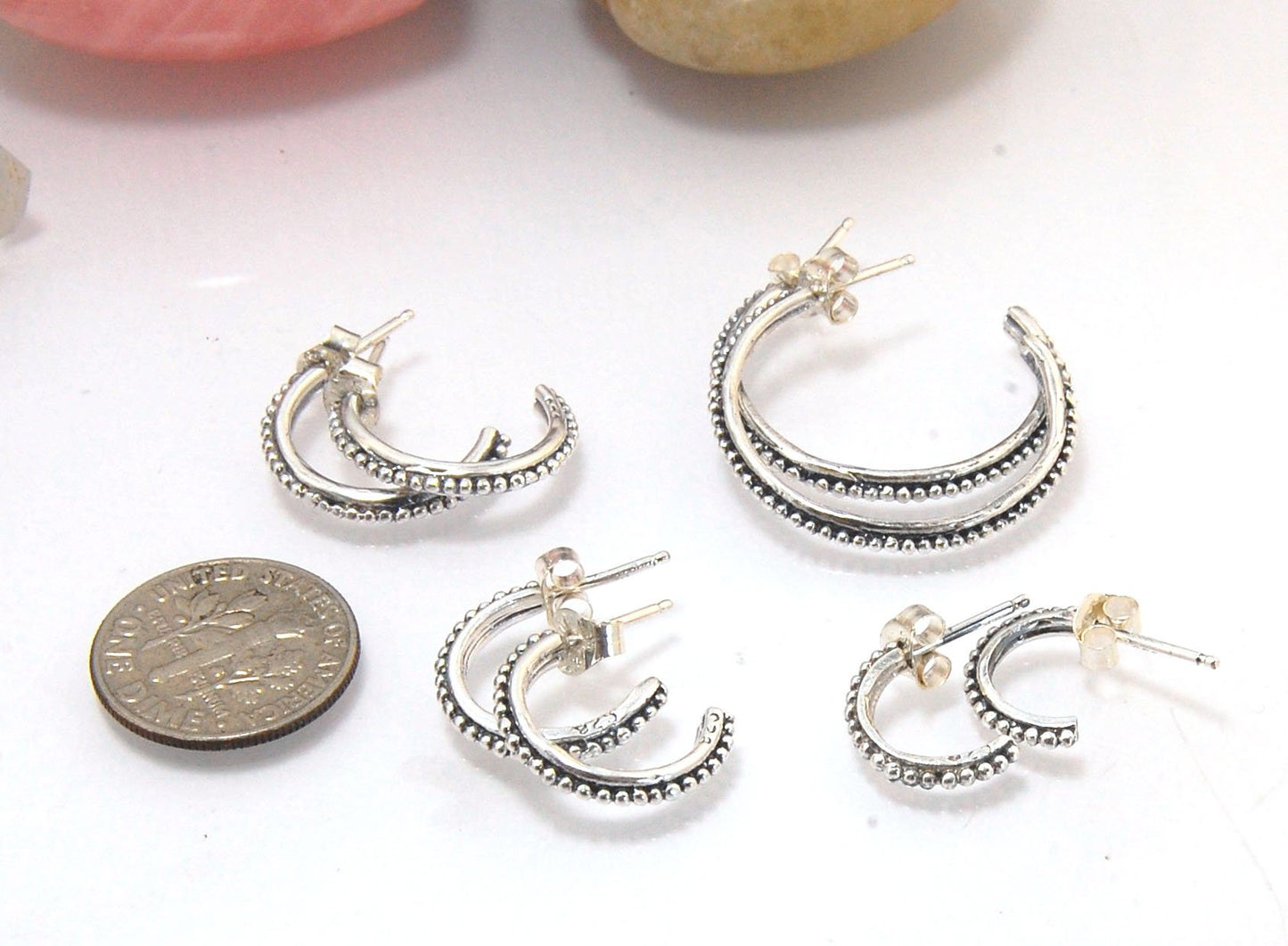 Etruscan Hoop Posts - Small in Sterling Silver and 14k gold These are my second smallest Etruscan Hoops as a post earring! Smaller than a dime - these post hoops hug your earlobe. So freakin’ cute! I like to wear them in my second piercing up. But y'all d
