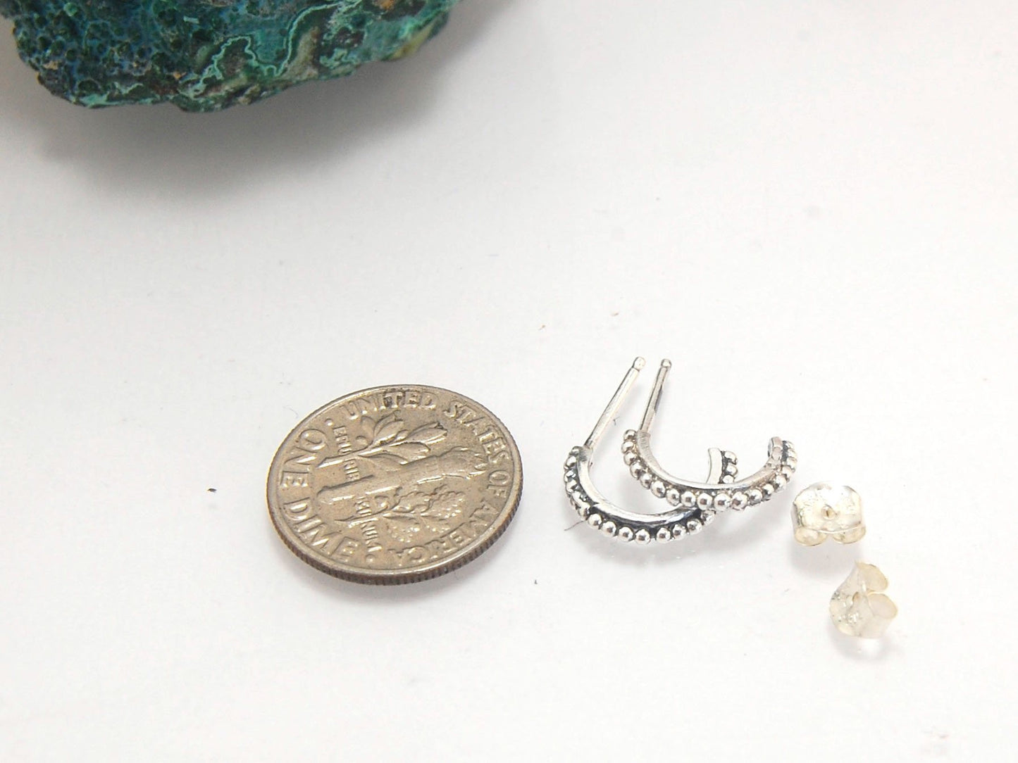 Etruscan Hoop Posts - Small in Sterling Silver and 14k gold These are my second smallest Etruscan Hoops as a post earring! Smaller than a dime - these post hoops hug your earlobe. So freakin’ cute! I like to wear them in my second piercing up. But y'all d