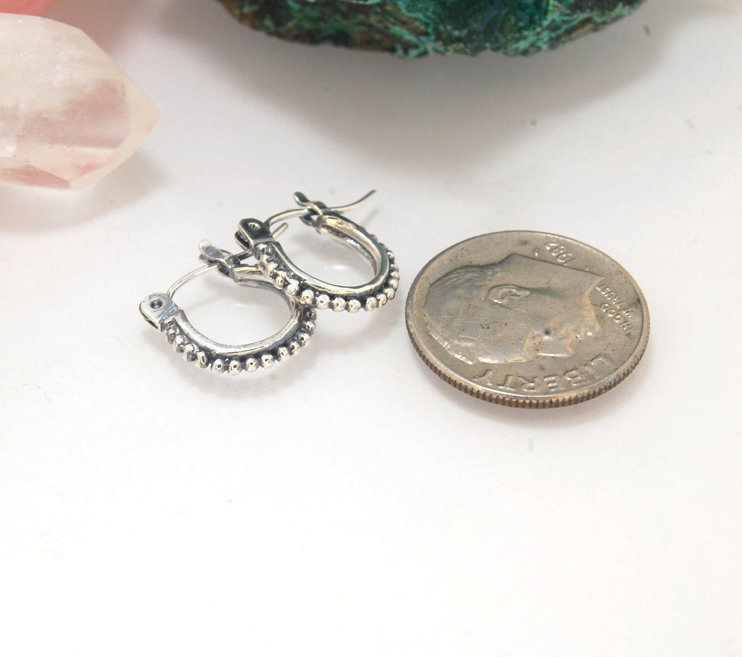 Etruscan hoops in Sterling Silver - xtraSmall Huggies These xtra small huggie hoops in sterling silver hoops are cast from a granulated master for a limited edition series of hoops and graze the bottom of your earlobe. I use fine silver for the original g