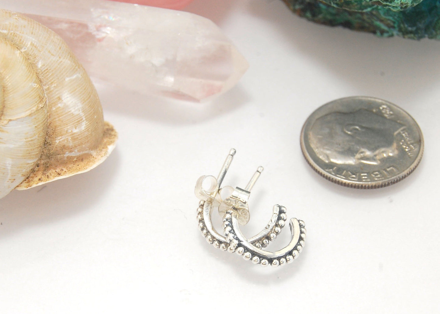 Etruscan Hoop Posts - Xtra Small in Sterling Silver These are my smallest Etruscan Hoops as a post-earring! Smaller than a dime - these post hoops hug your earlobe. So freakin’ cute! I like to wear them in my second piercing up and I prefer the gold! But
