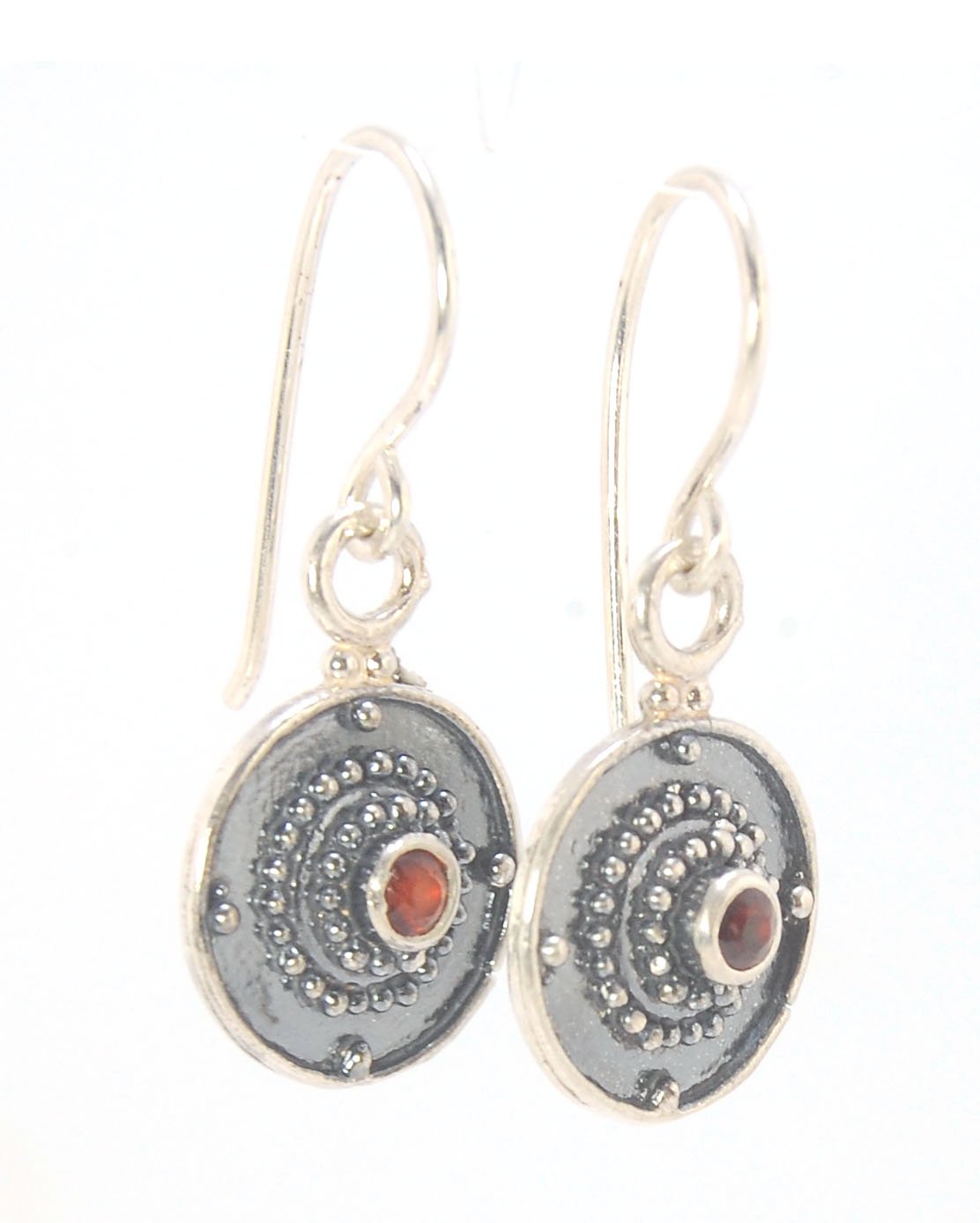 Dangle Shield Earrings in Sterling with Pink Garnet, Red Garnet, Blue Topaz, Peridot, or Amethyst These terrific shield earrings are cast from a granulated original. and is cast using the lost wax process. You can choose which stone to set in your sterlin