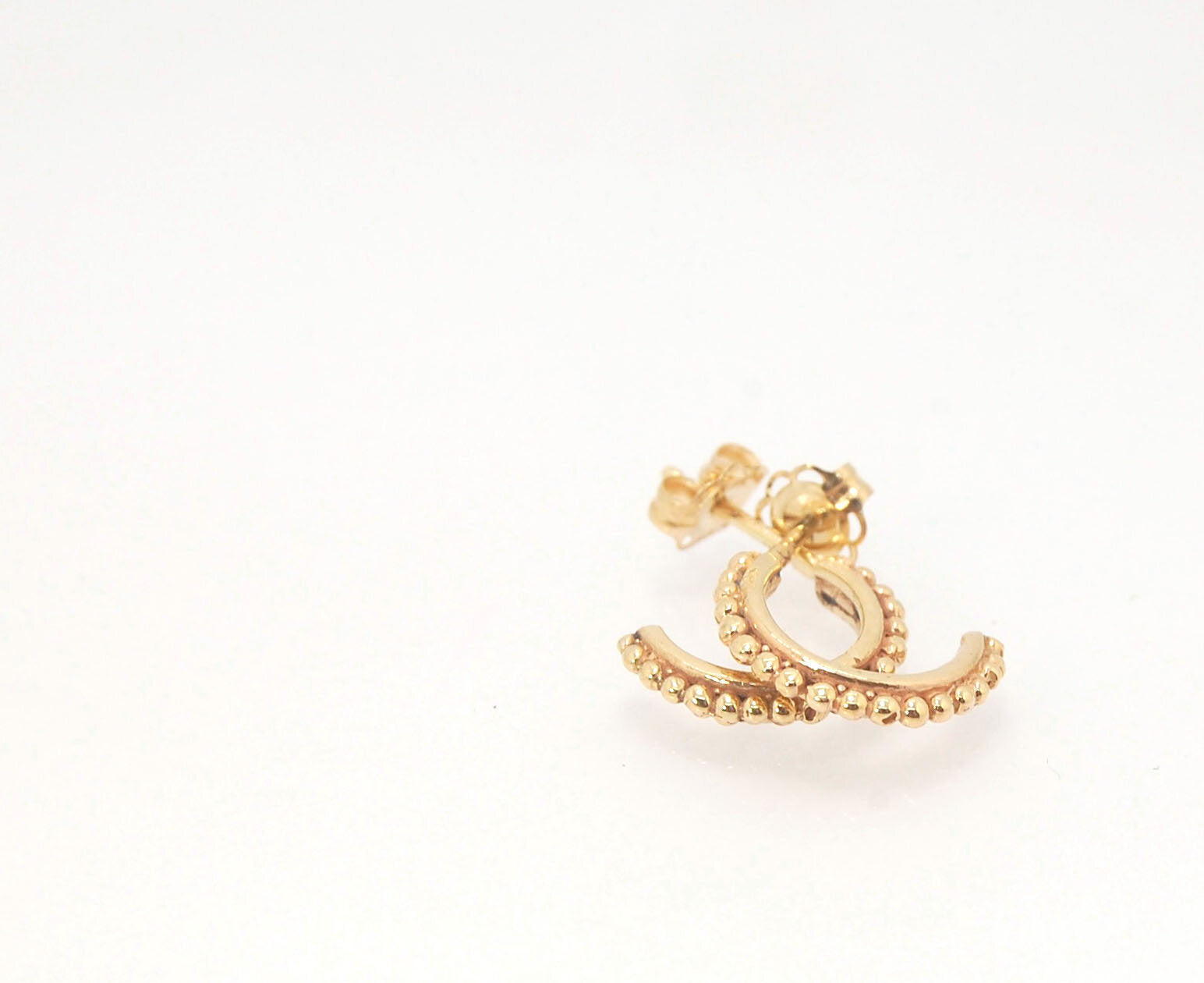 Etruscan Hoop Posts - Extra Small Huggies in 14k gold These are my smallest Etruscan Hoops as a post earring! Smaller than a dime - these post hoops hug your earlobe. So freakin’ cute! I like to wear them in my second piercing up and I prefer the gold! Bu