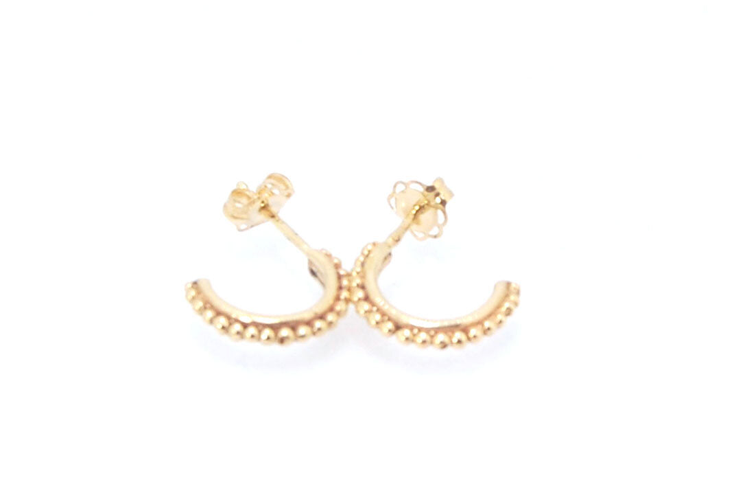 Etruscan Hoop Posts - Extra Small Huggies in 14k gold These are my smallest Etruscan Hoops as a post earring! Smaller than a dime - these post hoops hug your earlobe. So freakin’ cute! I like to wear them in my second piercing up and I prefer the gold! Bu