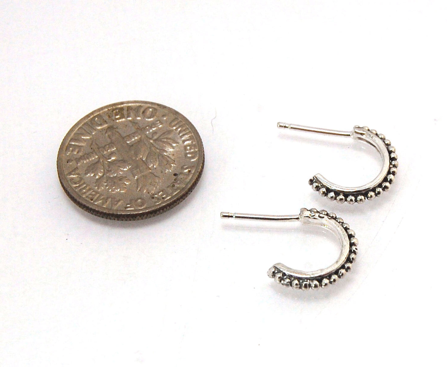 Etruscan Hoop Posts - Xtra Small in Sterling Silver These are my smallest Etruscan Hoops as a post-earring! Smaller than a dime - these post hoops hug your earlobe. So freakin’ cute! I like to wear them in my second piercing up and I prefer the gold! But