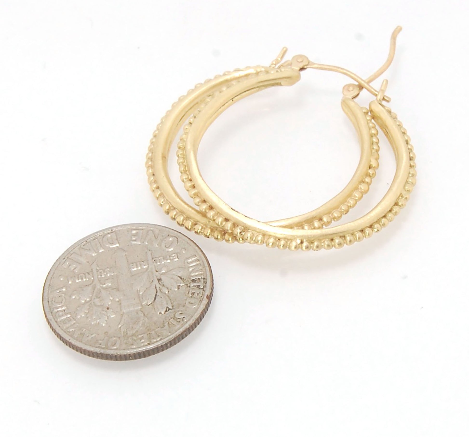 Etruscan hoops in 14k Gold - Large-SQ6408116 These 14k yellow gold hoops are cast in my studio (actually on the deck as casting needs good ventilation) from a granulated master for a limited edition series of hoops. I use fine silver for the original gran