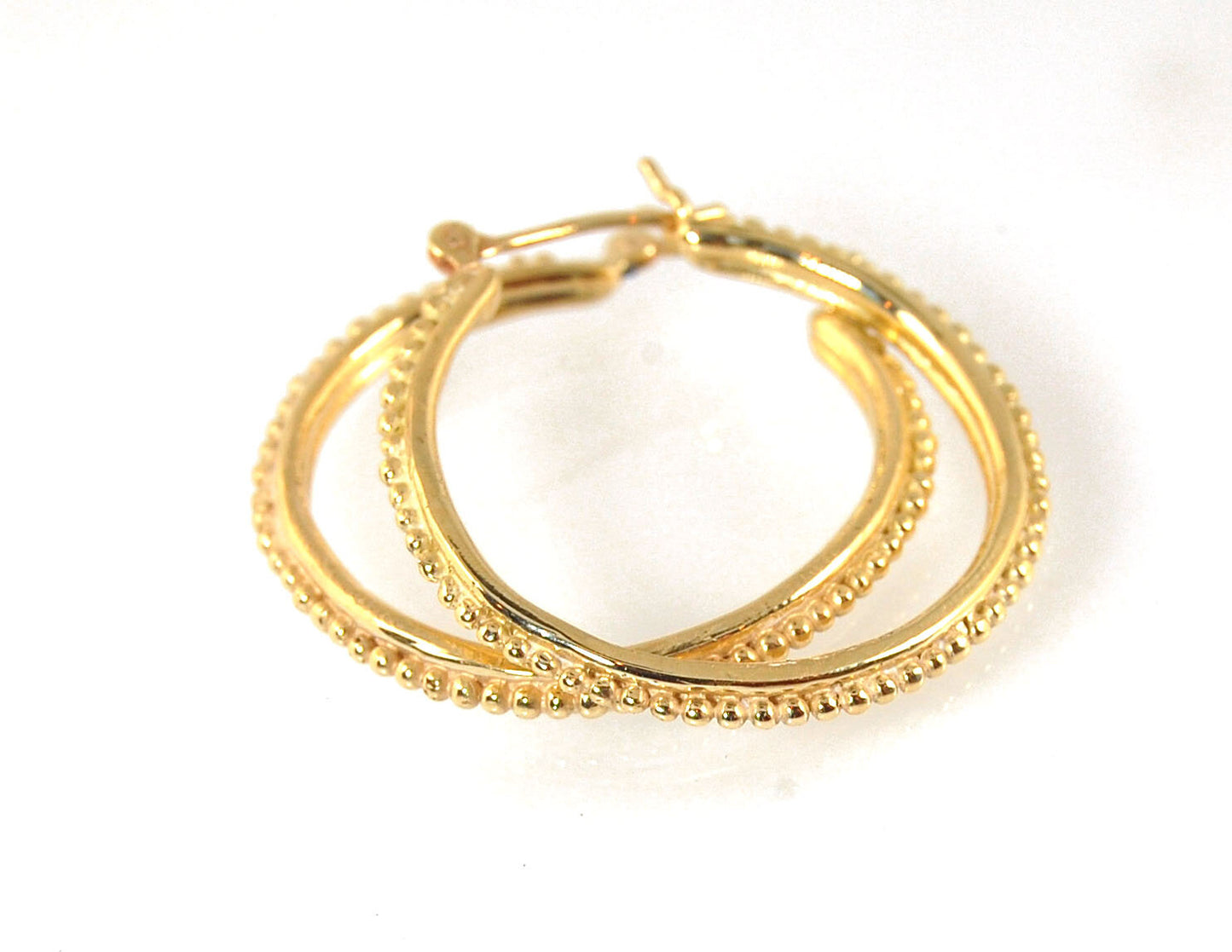 Etruscan hoops in 14k Gold - Large-SQ6408116 These 14k yellow gold hoops are cast in my studio (actually on the deck as casting needs good ventilation) from a granulated master for a limited edition series of hoops. I use fine silver for the original gran