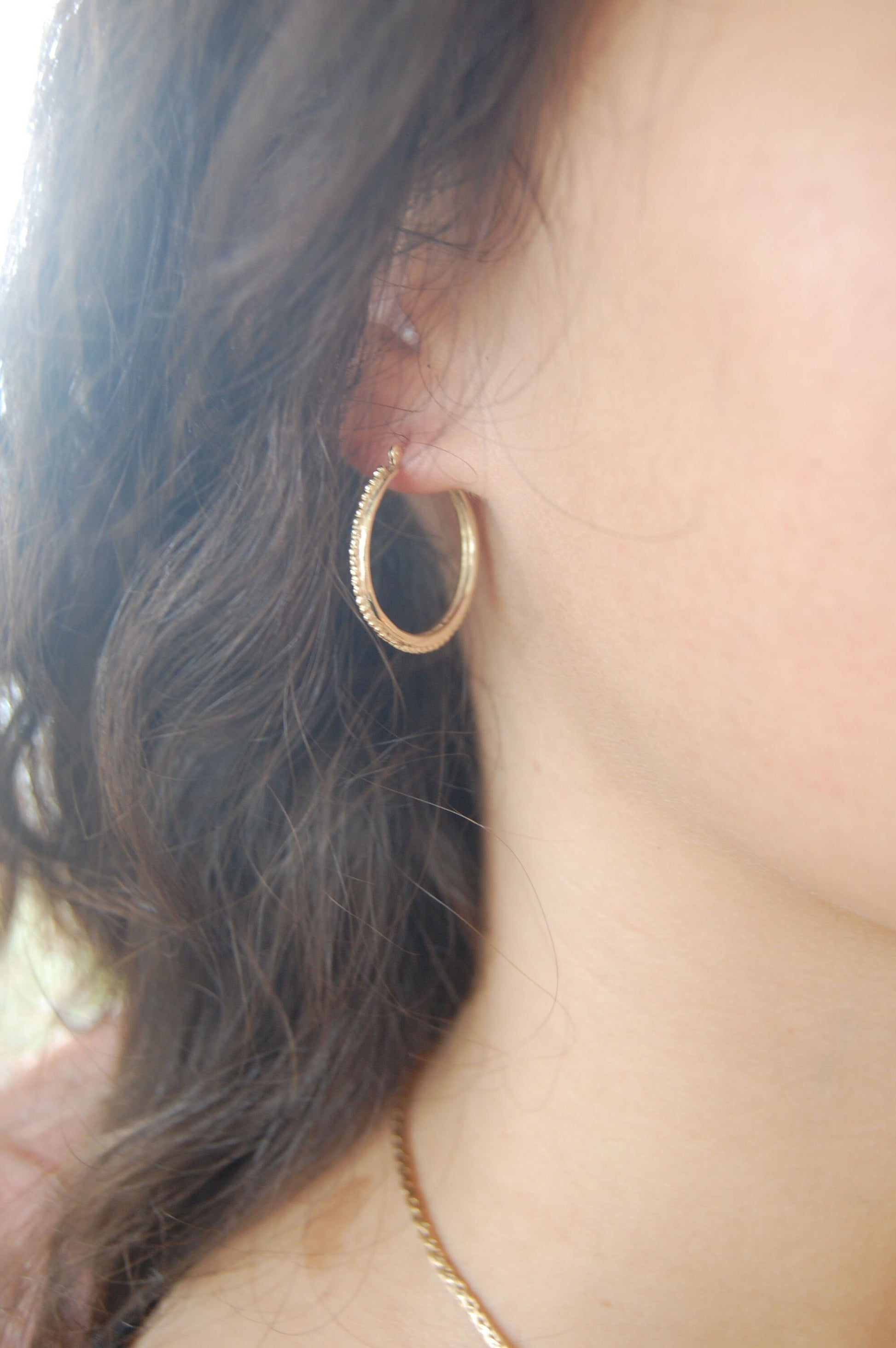 Etruscan hoops in 14k Gold - Large-SQ6408116 These 14k yellow gold hoops are cast in my studio (actually on the deck as casting needs good ventilation) from a granulated master for a limited edition series of hoops. I use fine silver for the original gran