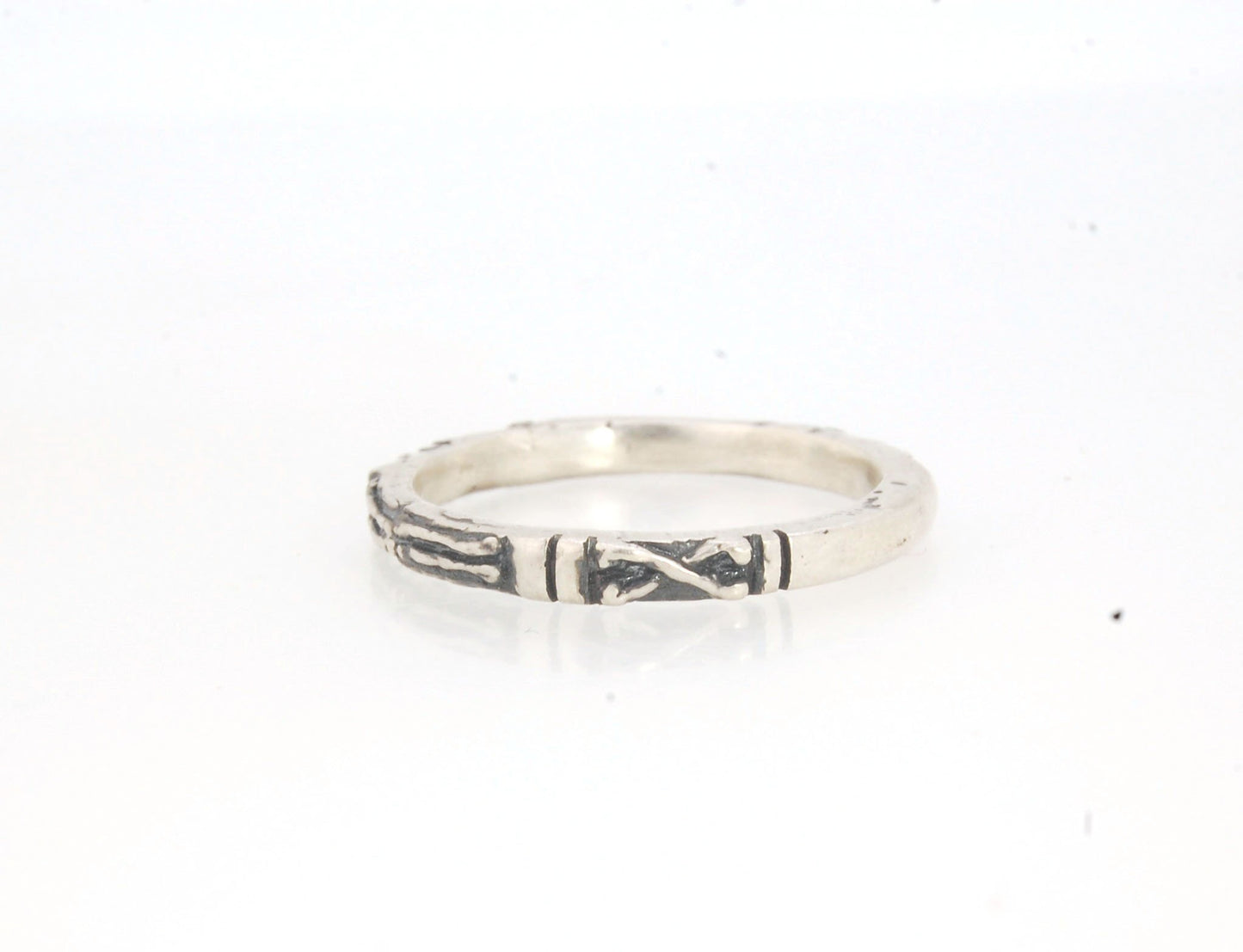 Oxidized Memento Mori Skeleton Ring - 2.7mm - Sterling Silver This is the most narrow of my Memento Mori Skeleton rings at 2.7mm wide! The Skeleton is flanked by crossed bones on one side and intertwined hearts and an hourglass on the other. This is the 4