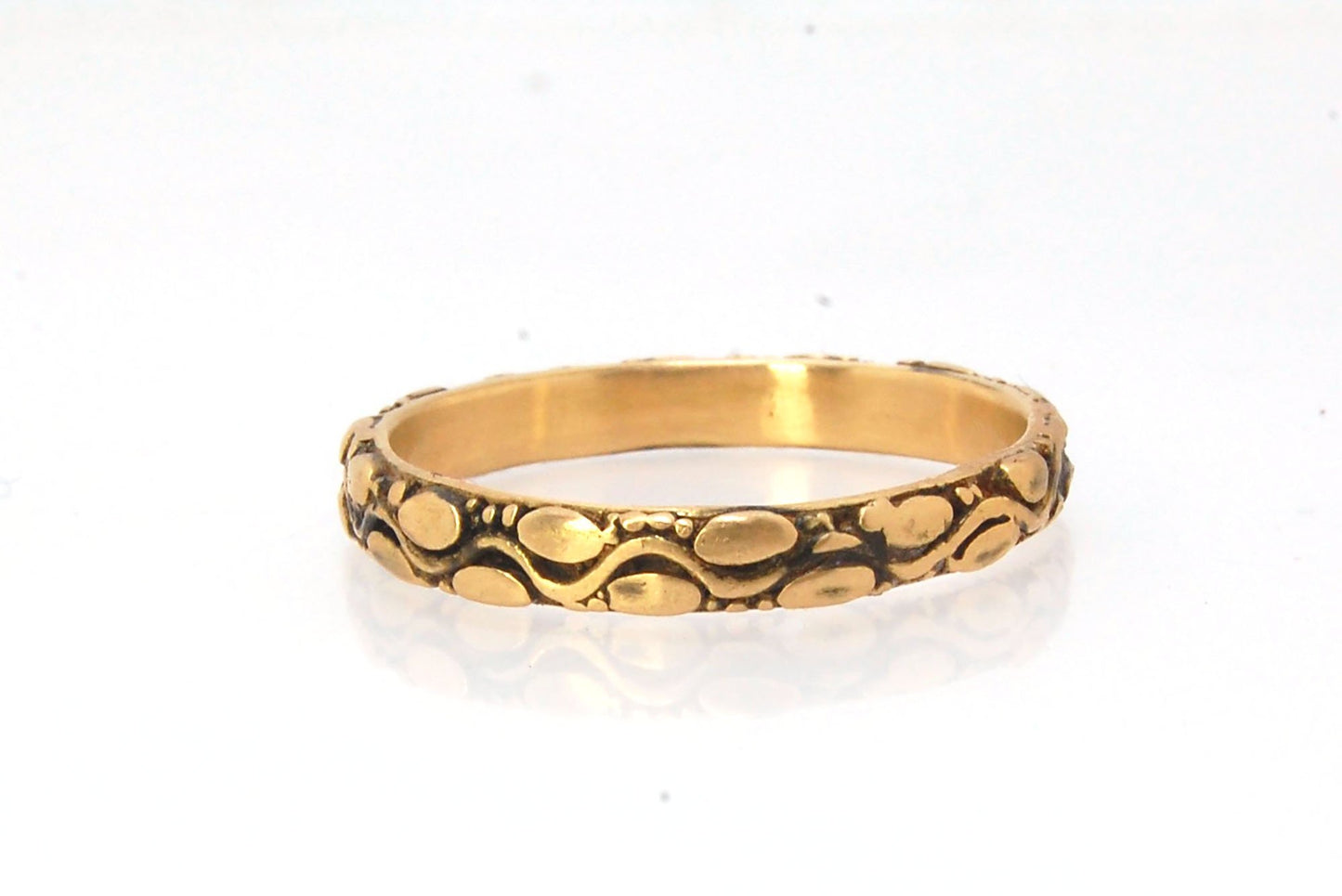 Ovals Pattern Band -3mm- Order in any size -14k, 18k, FS or Sterling This is a 3mm patterned band with small oval and small granules around a wavy center line. This is a cast version of a striking and fun band I originally made in fine silver using the pr