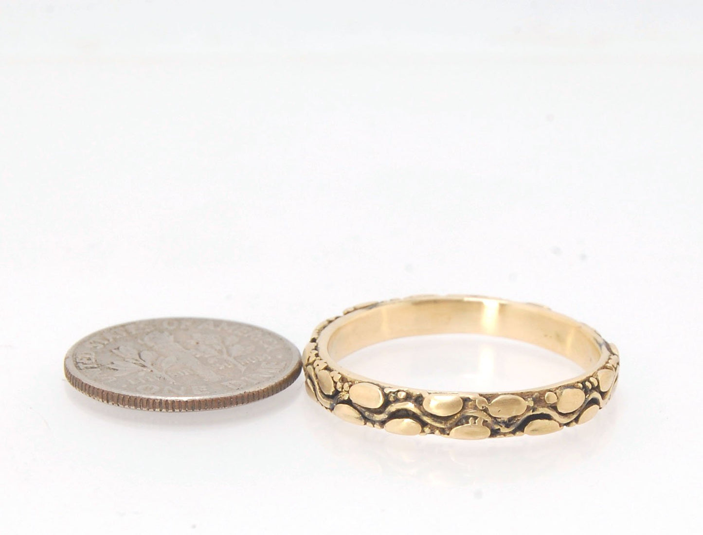 Ovals Pattern Band -3mm- Order in any size -14k, 18k, FS or Sterling This is a 3mm patterned band with small oval and small granules around a wavy center line. This is a cast version of a striking and fun band I originally made in fine silver using the pr