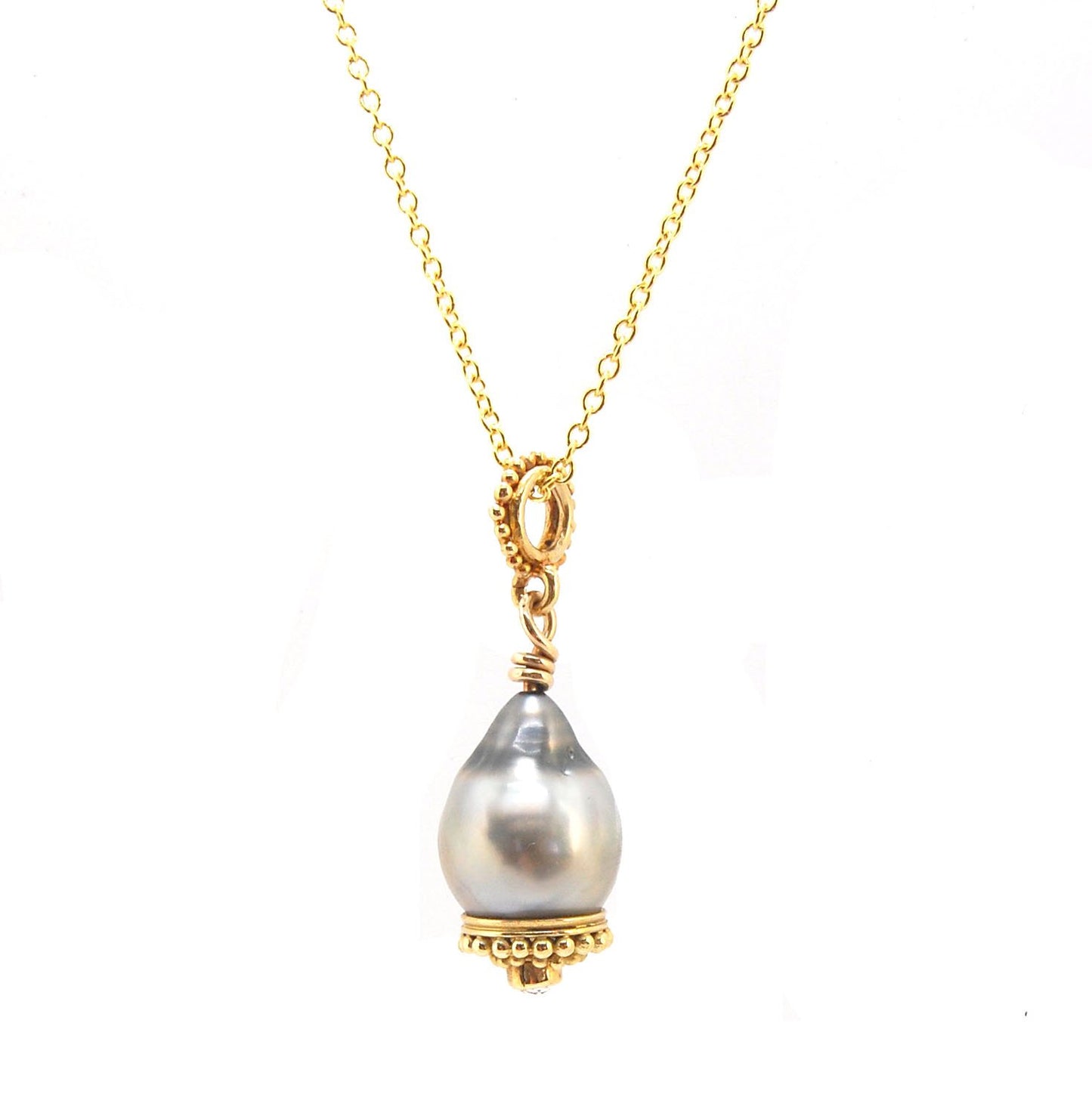 Baroque Grey Pearl with 18k gold Granulation and a Rosecut Diamond Ok this one is a stunner. 18k gold Granulated Dome with a 2.5 mm Rosecut Diamond and Granulated Bail pictured on an 18” peacock black oxidized Sterling Silver chain. Granulation is an anci