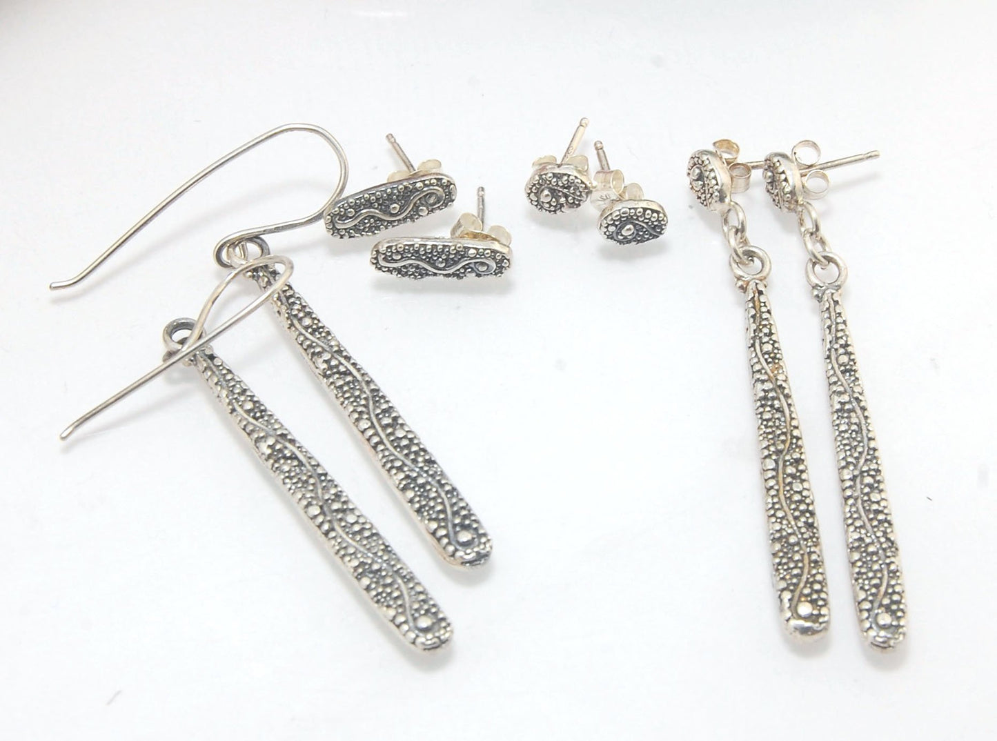 Seaweed Long Dangle Post Earrings These seaweed Post dangle earrings are cast versions of my original granulation work. Once the original work is made using the ancient technique of granulation, it is then molded for repeat waxes and then cast using the L