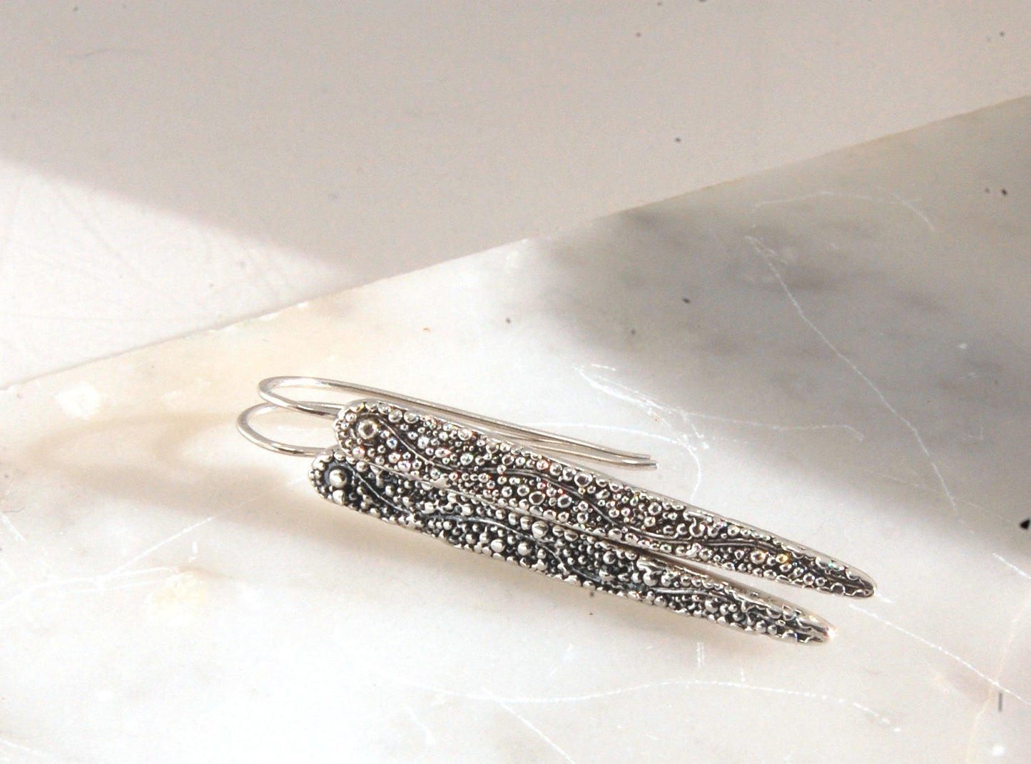 Seaweed Pattern Long Dagger French Hook Earrings with safety clasp Look at that sparkle! These seaweed dagger dangle earrings are long, elegant points of silver filled with a granulation pattern I call Seaweed, as it looks like it has so much movement in