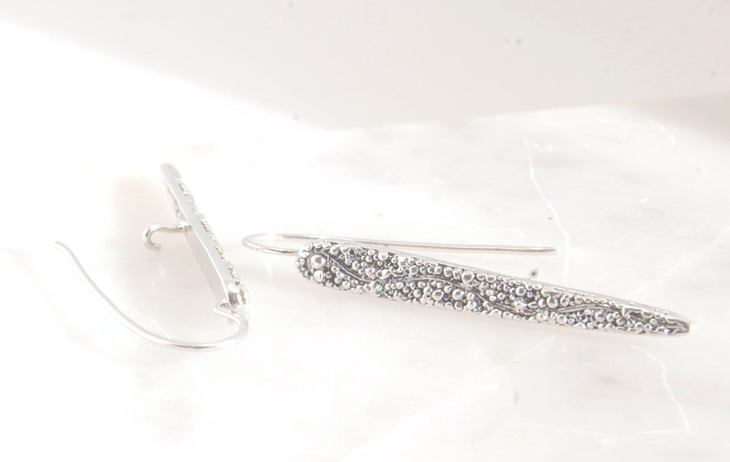 Seaweed Pattern Long Dagger French Hook Earrings with safety clasp Look at that sparkle! These seaweed dagger dangle earrings are long, elegant points of silver filled with a granulation pattern I call Seaweed, as it looks like it has so much movement in