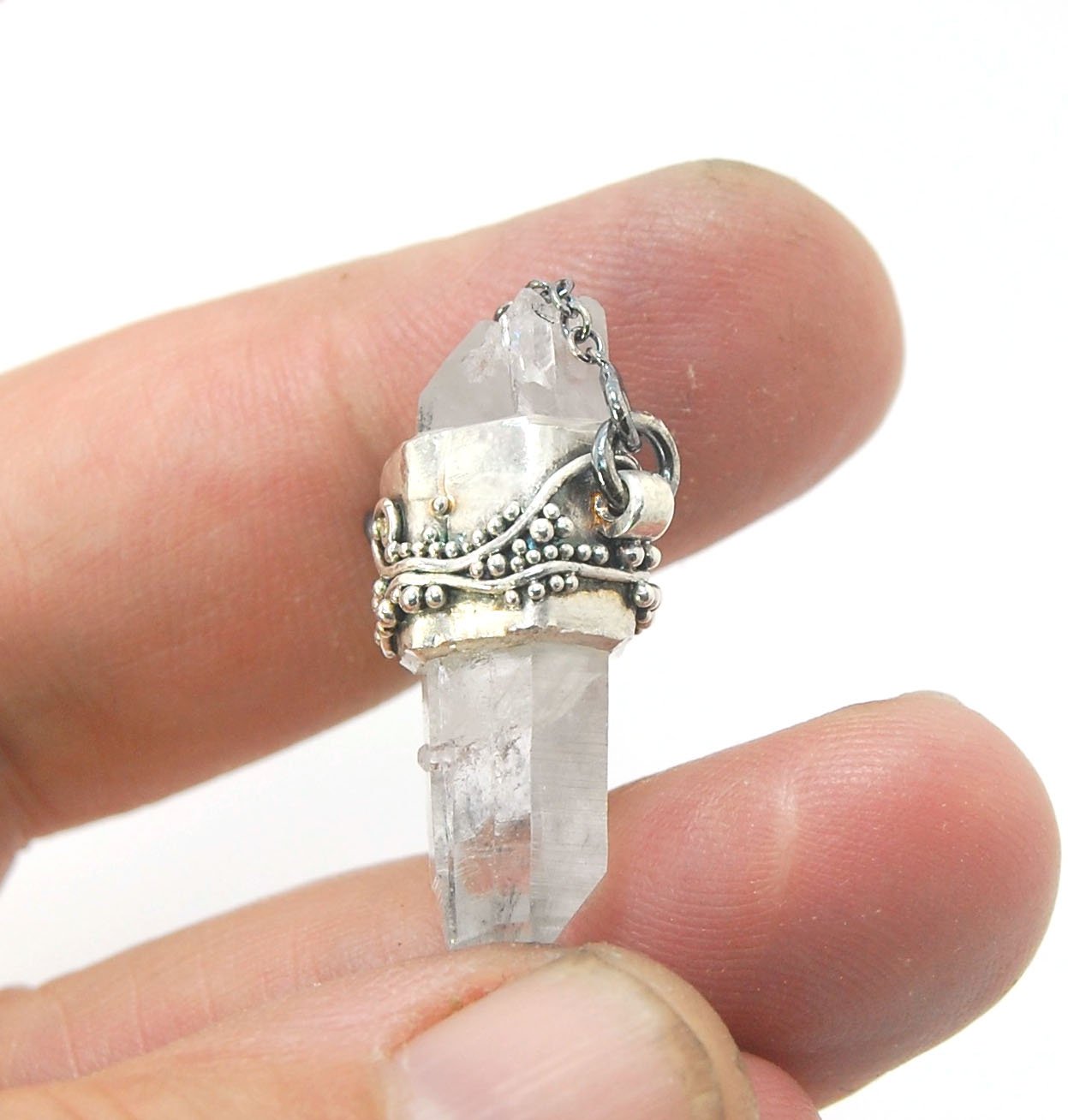 Slant Top Lemurian Quartz Crystal Necklace with Fine Silver granulated girdle I love making these crystal pendants. The silver girdle is hand shaped in fine silver to fit this specific crystal and then is granulated with fine silver wires and granules. Gr