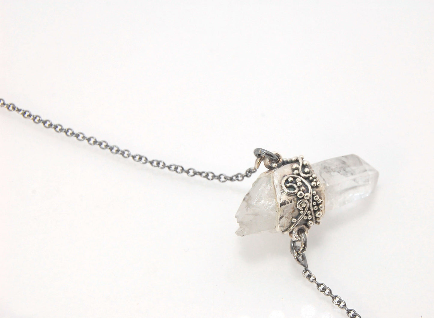 Slant Top Lemurian Quartz Crystal Necklace with Fine Silver granulated girdle I love making these crystal pendants. The silver girdle is hand shaped in fine silver to fit this specific crystal and then is granulated with fine silver wires and granules. Gr