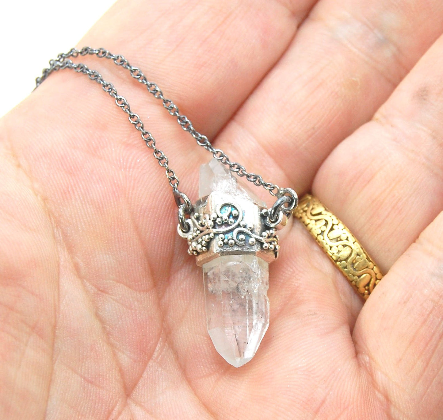 Slant Top Lemurian Quartz Crystal Necklace with Fine Silver granulated girdle I love making these crystal pendants. The silver girdle is hand shaped in fine silver to fit this specific crystal and then is granulated with fine silver wires and granules. Gr