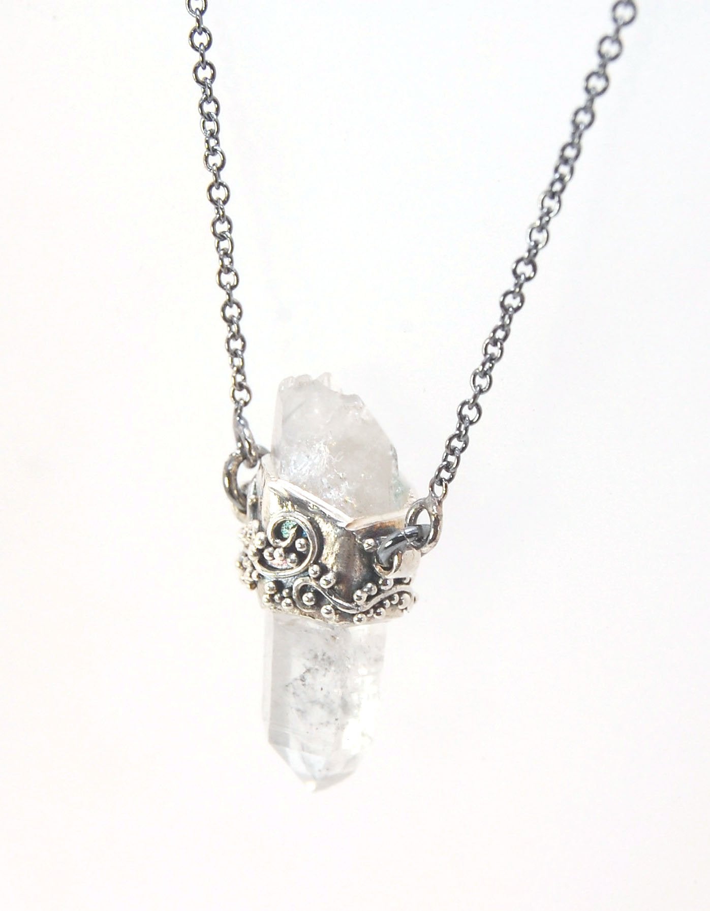 Slant Top Lemurian Quartz Crystal Necklace with Fine Silver granulated girdle I love making these crystal pendants. The silver girdle is hand shaped in fine silver to fit this specific crystal and then is granulated with fine silver wires and granules. Gr