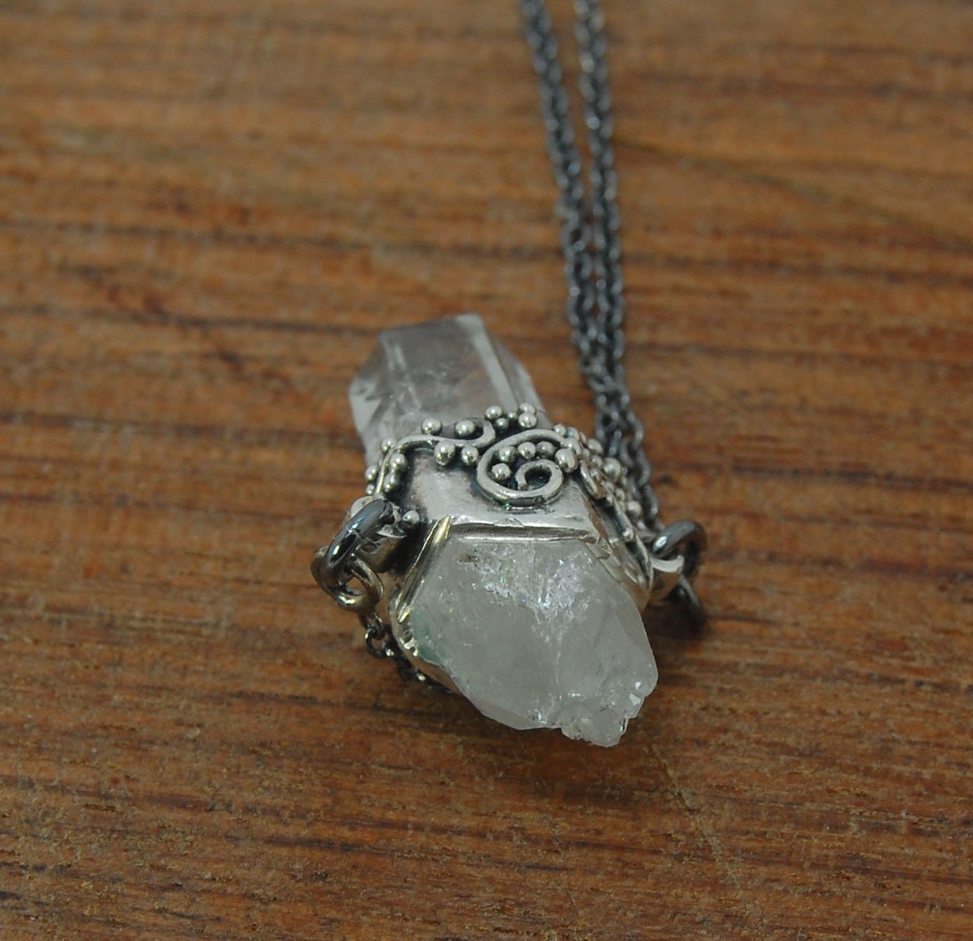 Slant Top Lemurian Quartz Crystal Necklace with Fine Silver granulated girdle I love making these crystal pendants. The silver girdle is hand shaped in fine silver to fit this specific crystal and then is granulated with fine silver wires and granules. Gr