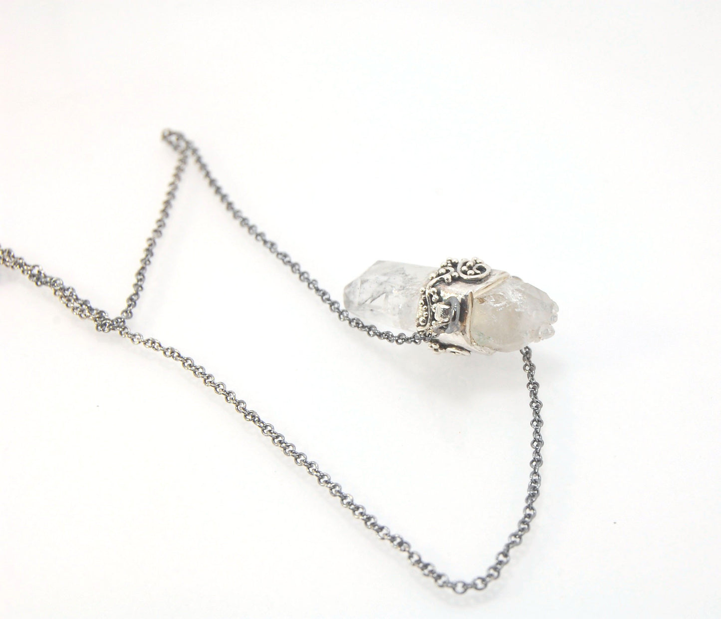 Slant Top Lemurian Quartz Crystal Necklace with Fine Silver granulated girdle I love making these crystal pendants. The silver girdle is hand shaped in fine silver to fit this specific crystal and then is granulated with fine silver wires and granules. Gr
