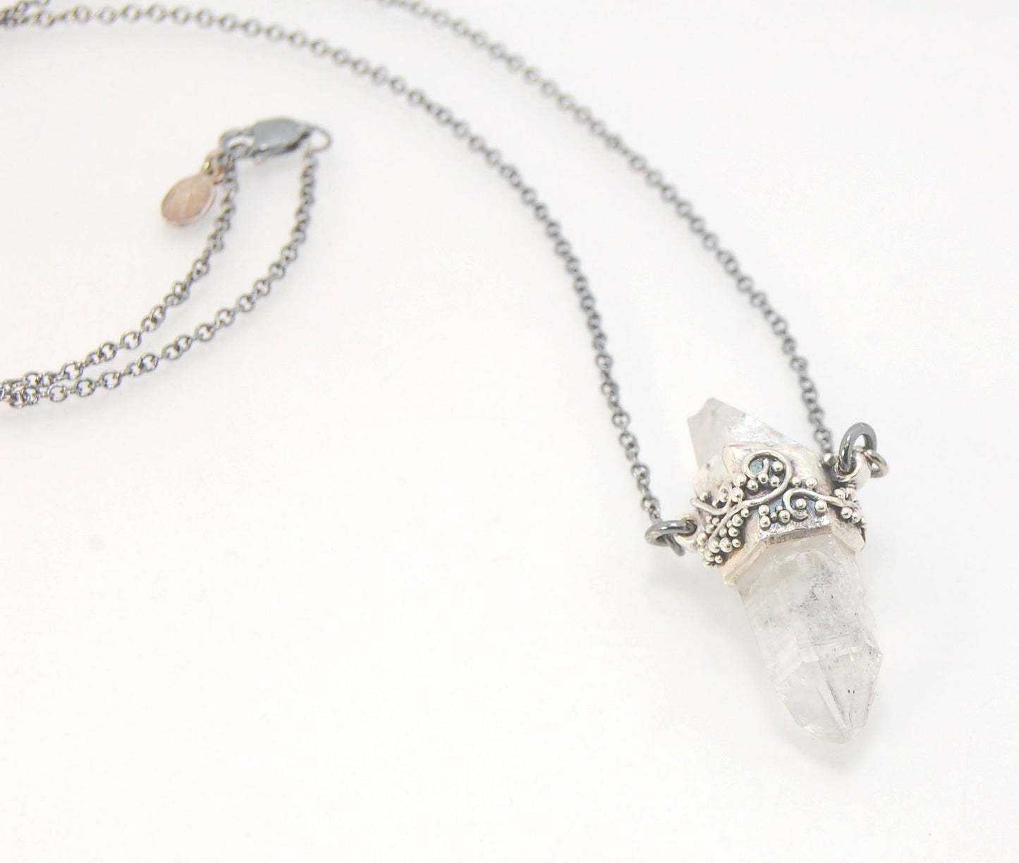Slant Top Lemurian Quartz Crystal Necklace with Fine Silver granulated girdle I love making these crystal pendants. The silver girdle is hand shaped in fine silver to fit this specific crystal and then is granulated with fine silver wires and granules. Gr