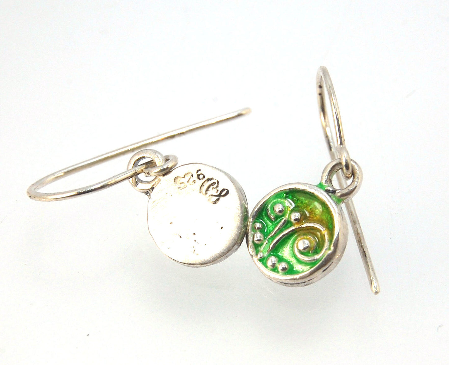 Enameled Sterling Fern Earrings -Circle -Small These are my smallest fern circles and they can be enameled in 8 colors for you!Prussian Blue, Icy Blue, Turquoise, Oil Gray, Forest Green, Jade Green, Sage Green or Periwinkle BlueGreen.These enameled 11mm o